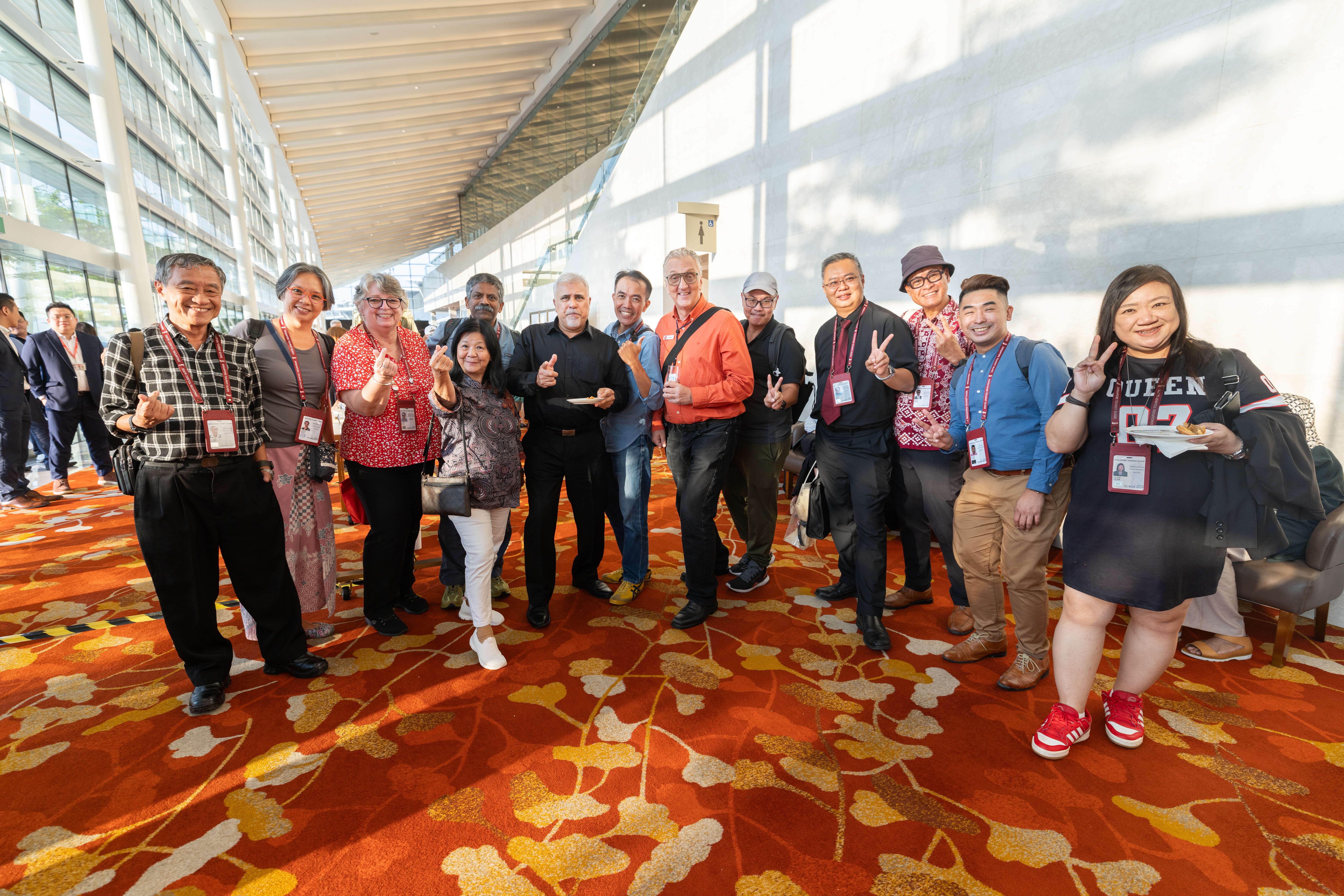 Group of tourist guides, tour operators and travel agents smiling and posing during the Evening Networking Session.
