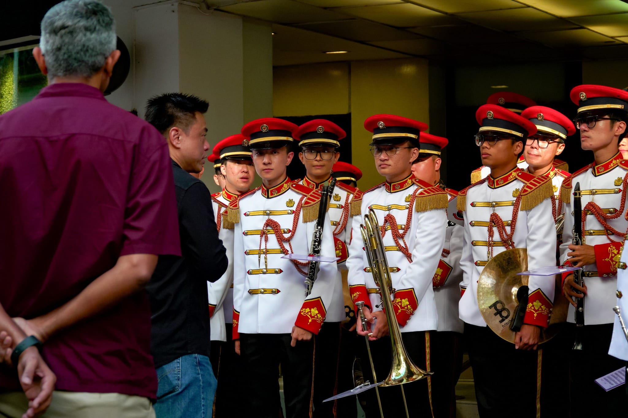 Commander Military Police (MP) Command COL Low Puay Kng addressing the band.