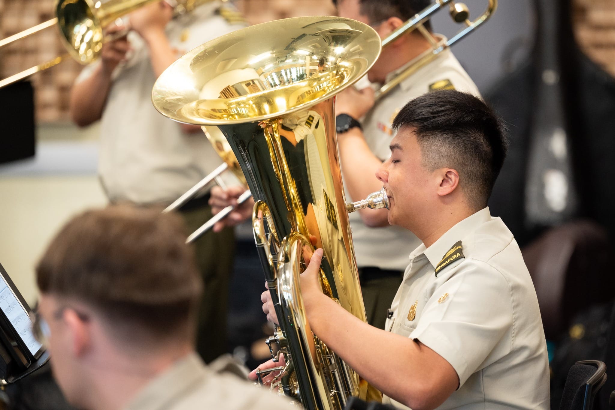 Associate Principal Tuba ME2 Shawn Yap Jiaqu in rehearsal.