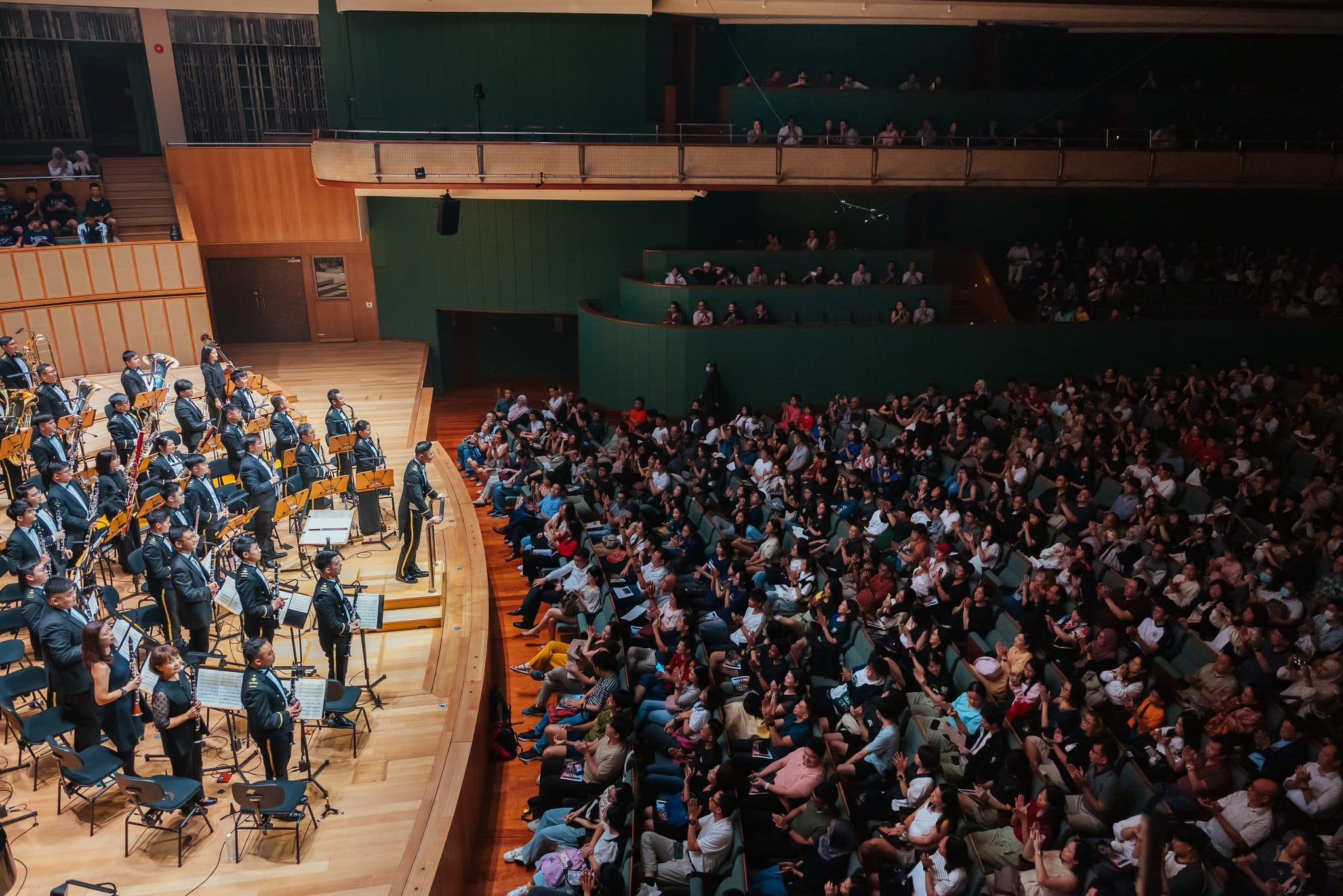 A full house at the Esplanade Concert Hall, while the SAF Central Band takes the stage.