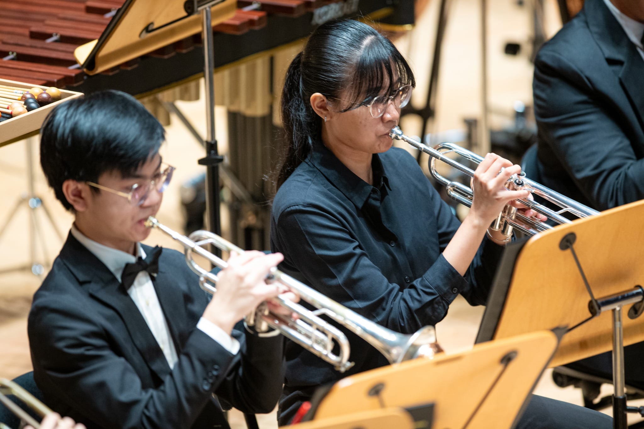 NYW trumpeters Tan Theng Hong Joshua and Nur Imaan Binte Zulkiffli in performance.