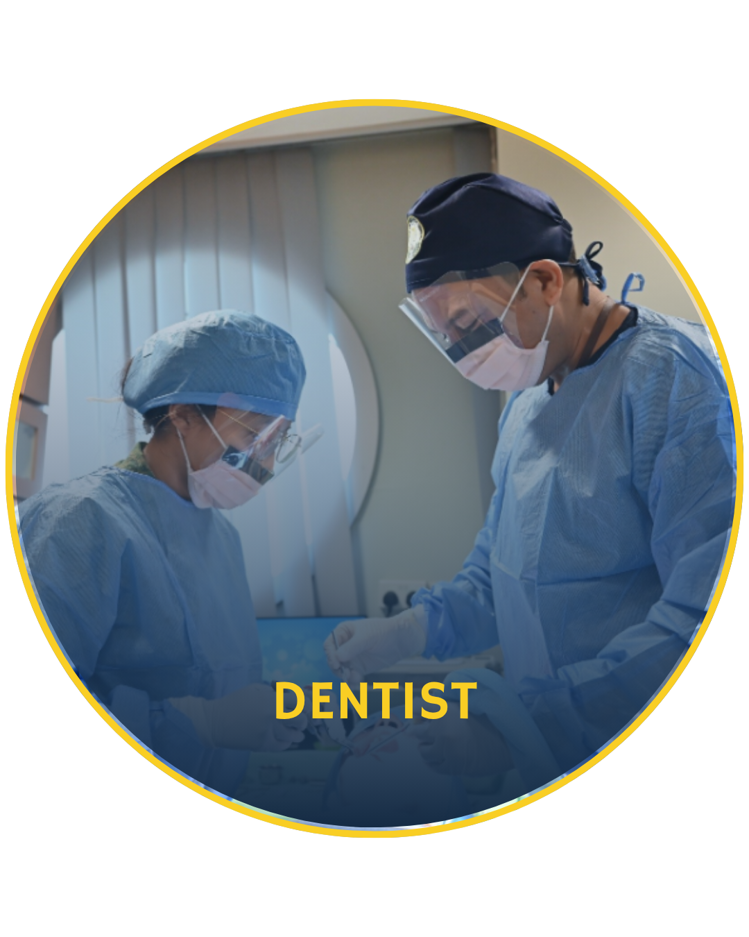 SAFVC Dentist in scrubs working attending to a patient with another dentist.