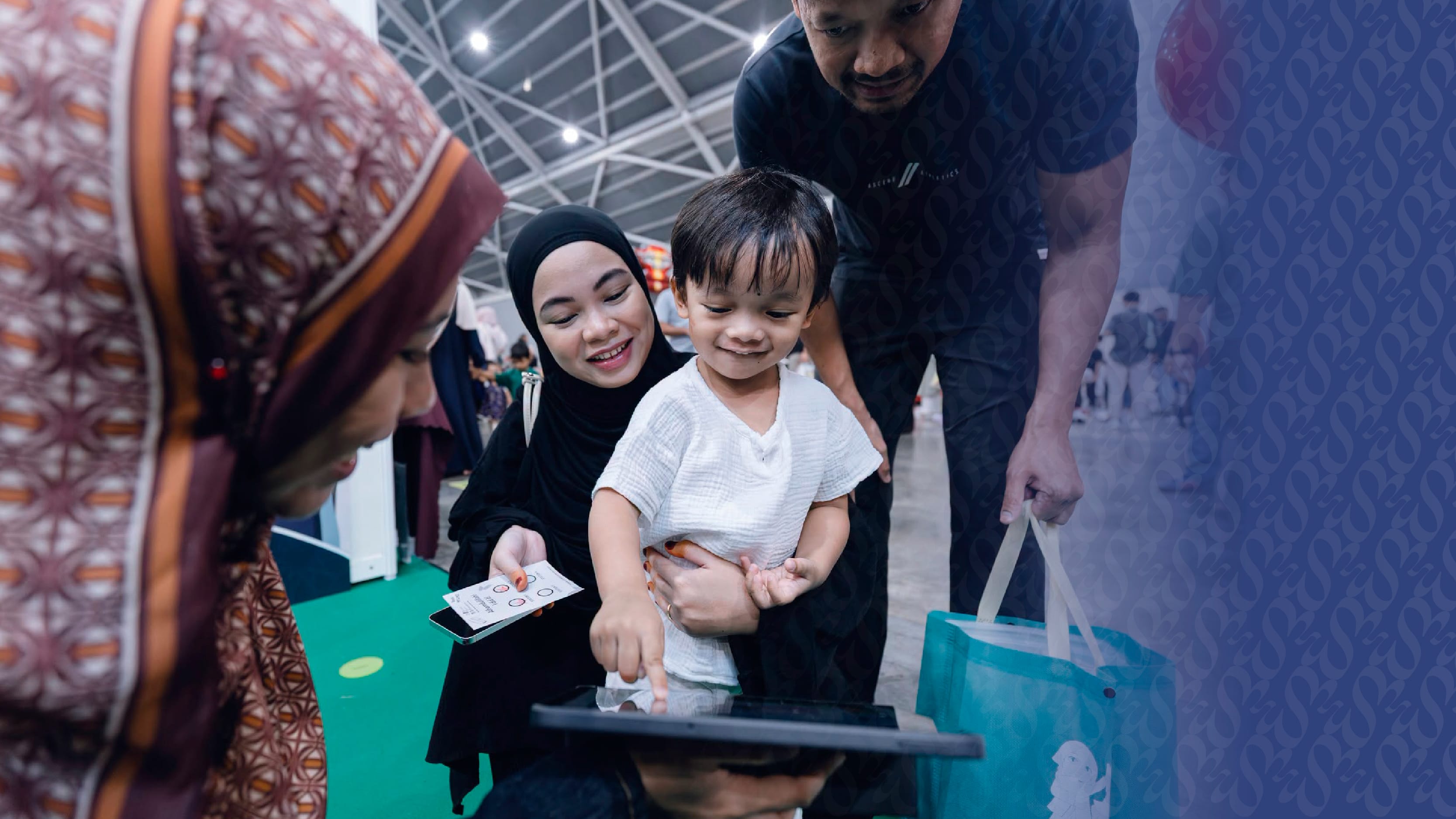 This is a photo of a child and adults at an event.