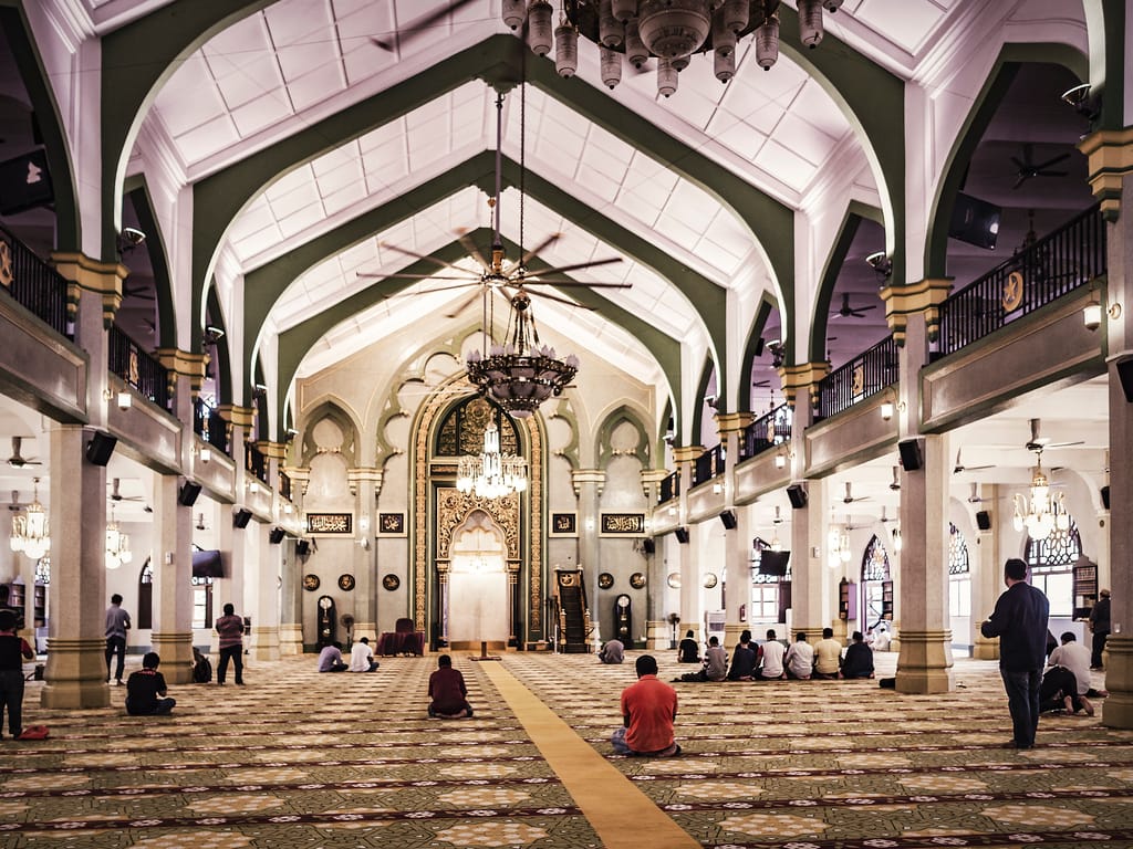 People praying inside the Masjid Sultan mosque in Singapore