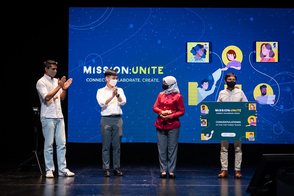 Photo of Singapore's Former President Halimah Yacob presenting the awards to the winners