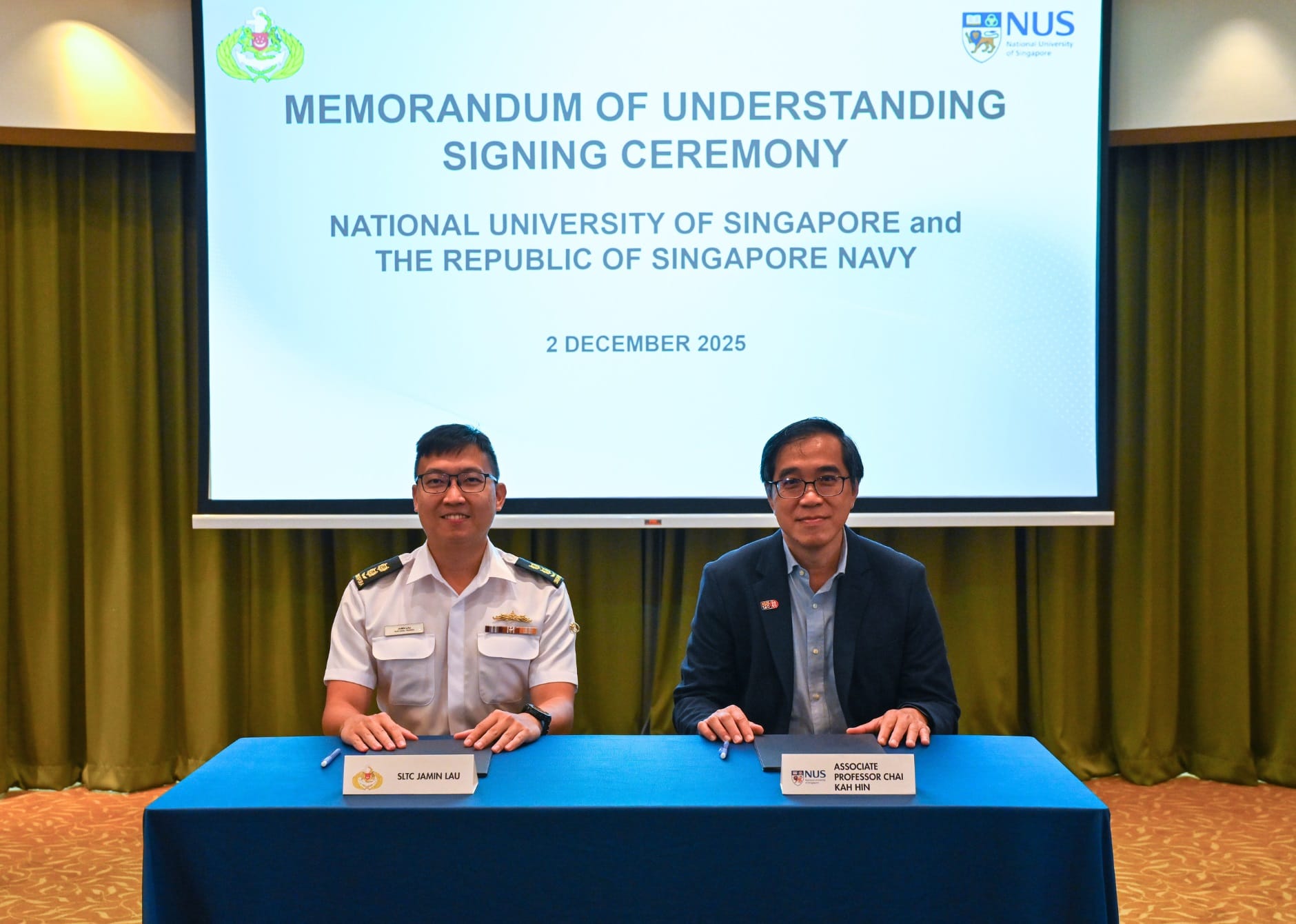 Head of Naval Training Department SLTC Jamin Lau (left) and Dean of NUS-Scale Associate Professor Chai Kah Hin (right)