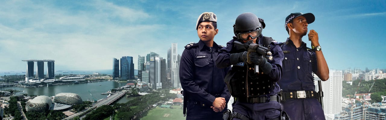 Three SPF officers in uniform posed against Singapore skyline background.
