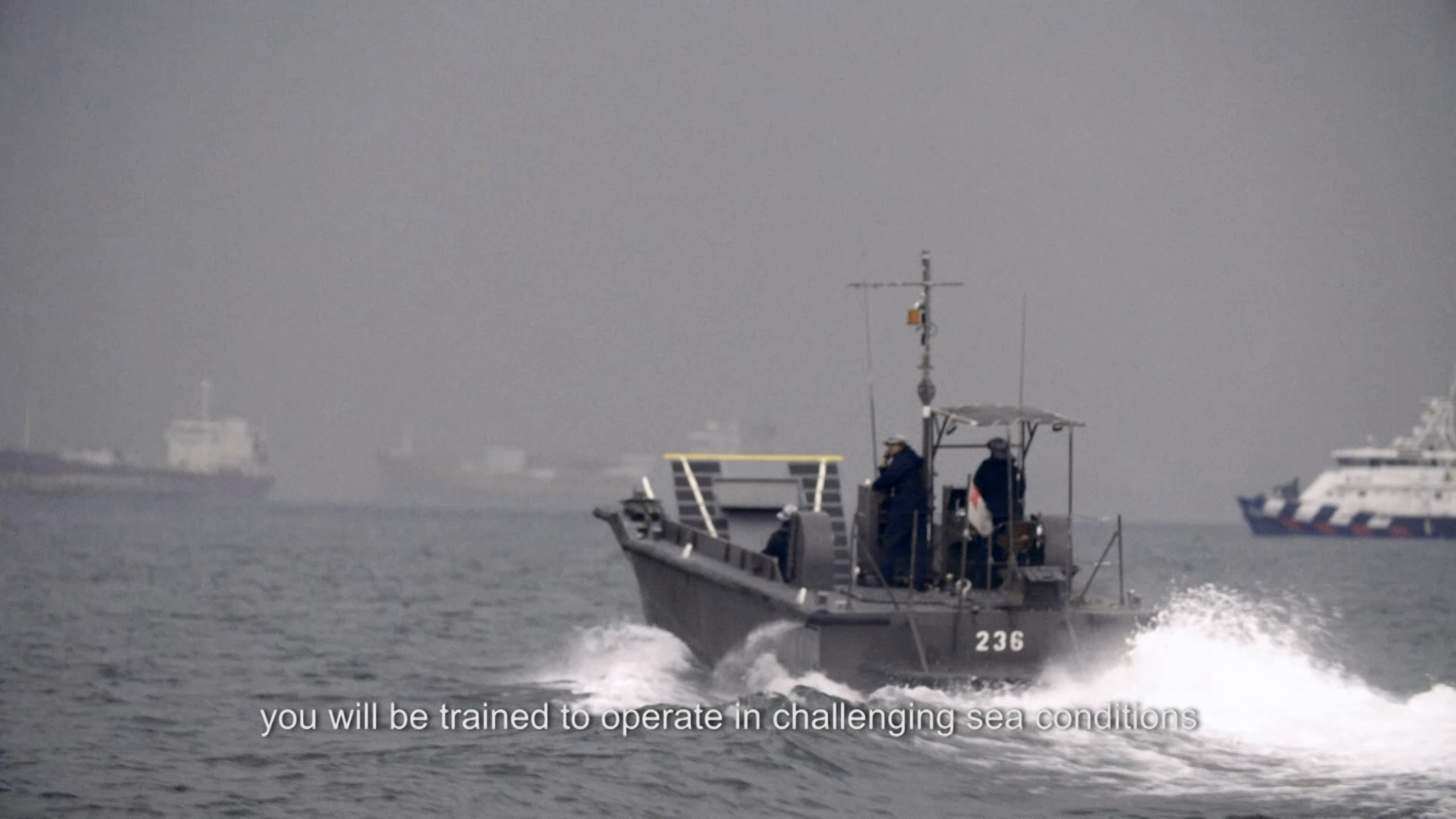 Naval vessel speeding through open sea during SAF maritime operations.