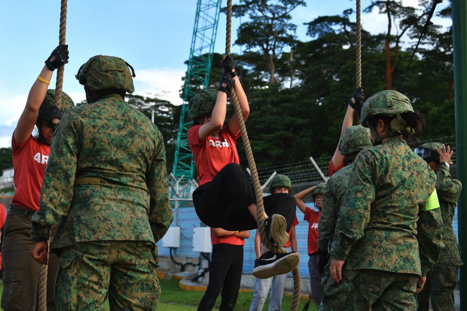 Camp participants undergoing the Standard Obstacle Course.