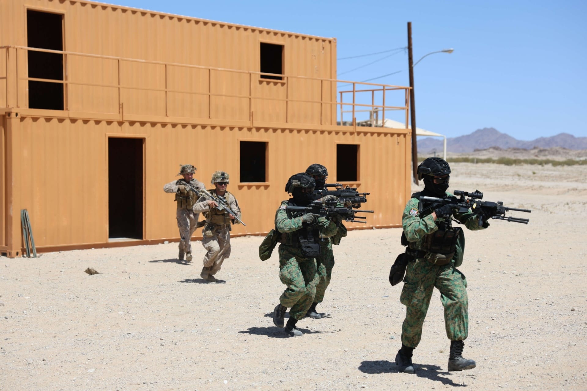 Soldiers from the SAF and the United States Marine Corps (USMC) participating in urban operations training as part of Exercise Valiant Mark (XVM).