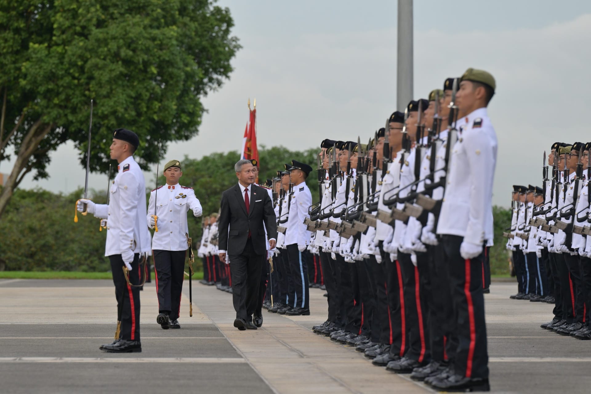 Minister for Foreign Affairs Dr Vivian Balakrishnan reviewing the contingents at the 138th Officer Cadet Commissioning P