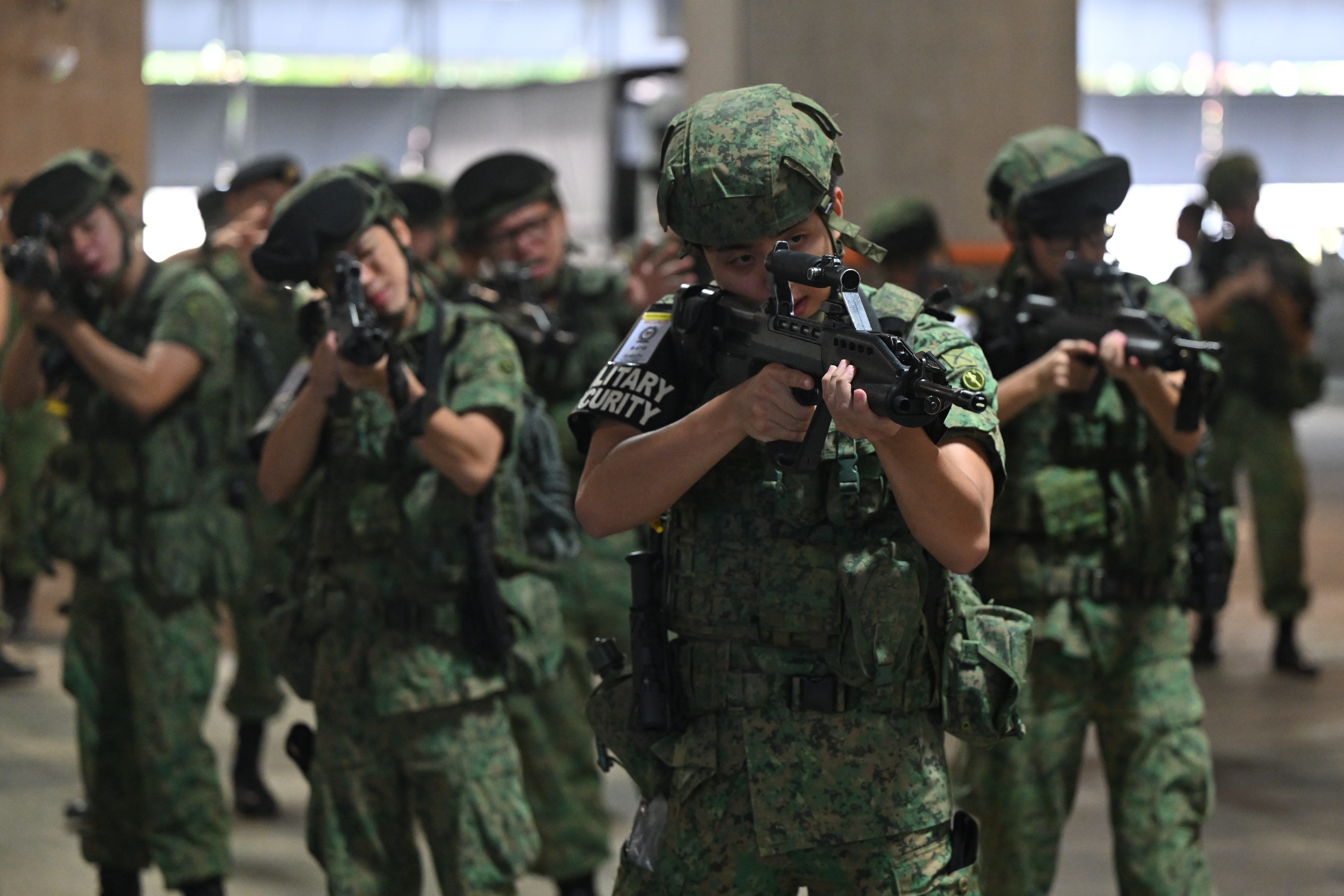 Activated soldiers conducting weapons drills as part of their Just-In-Time Training.