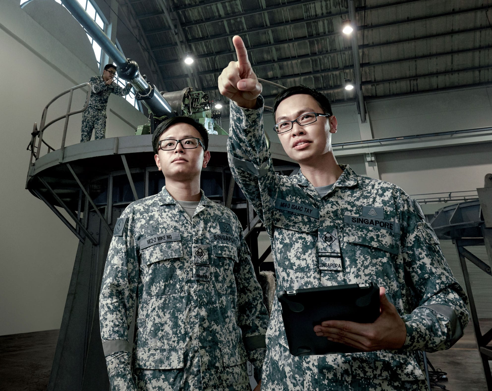 SAF personnel inspecting equipment indoors, highlighting transparency through audit and checks.