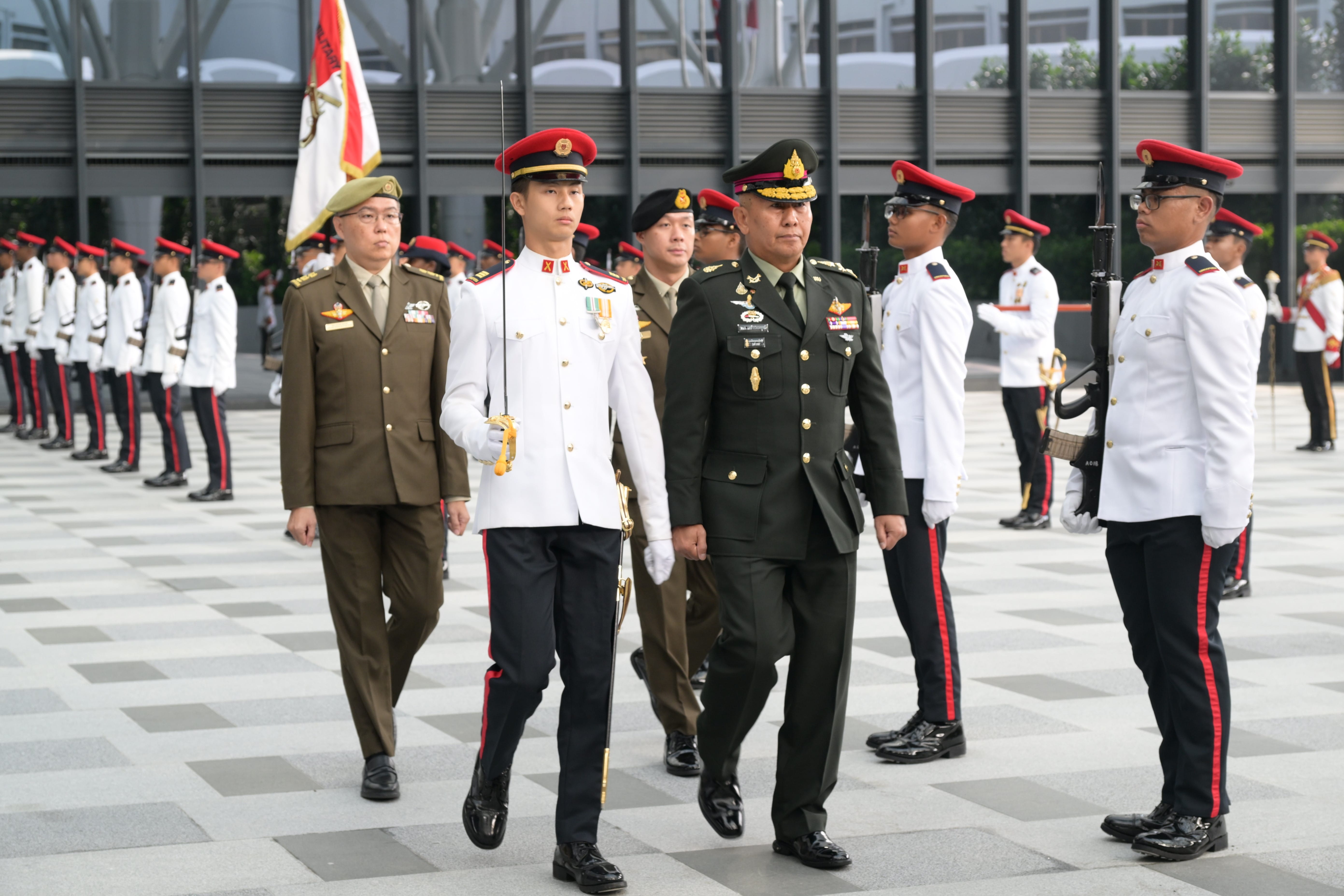 GEN Pana inspecting the Guard of Honour at MINDEF this morning.
