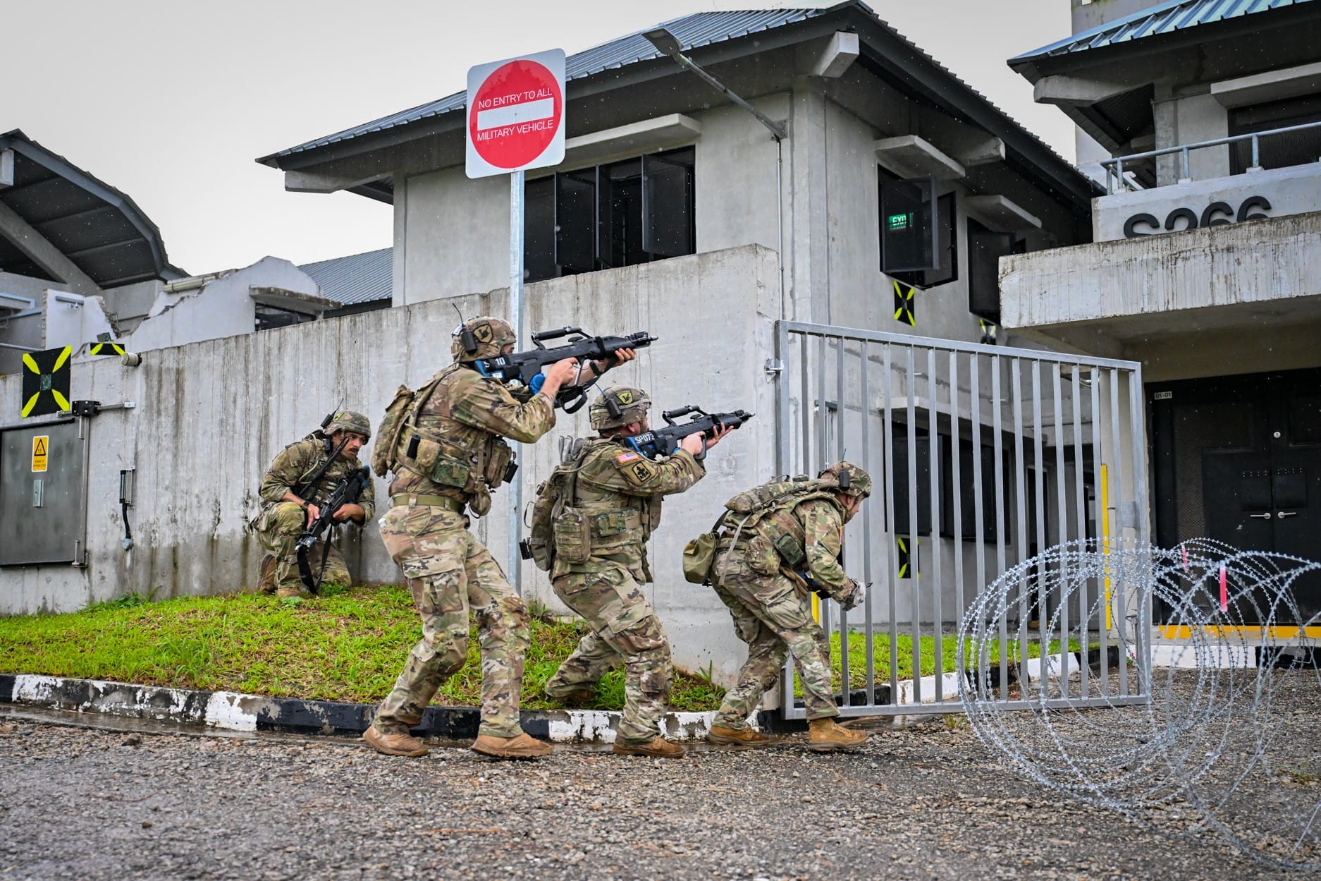 Soldiers from the US Army conducting an assault on an urban objective.