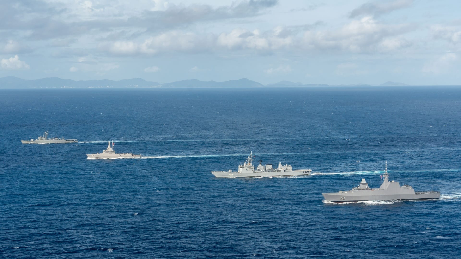 Ships from the Republic of Singapore Navy (RSN) and the Royal Thai Navy (RTN) manoeuvring in formation during the sea phase of Exercise Singsiam 2026.