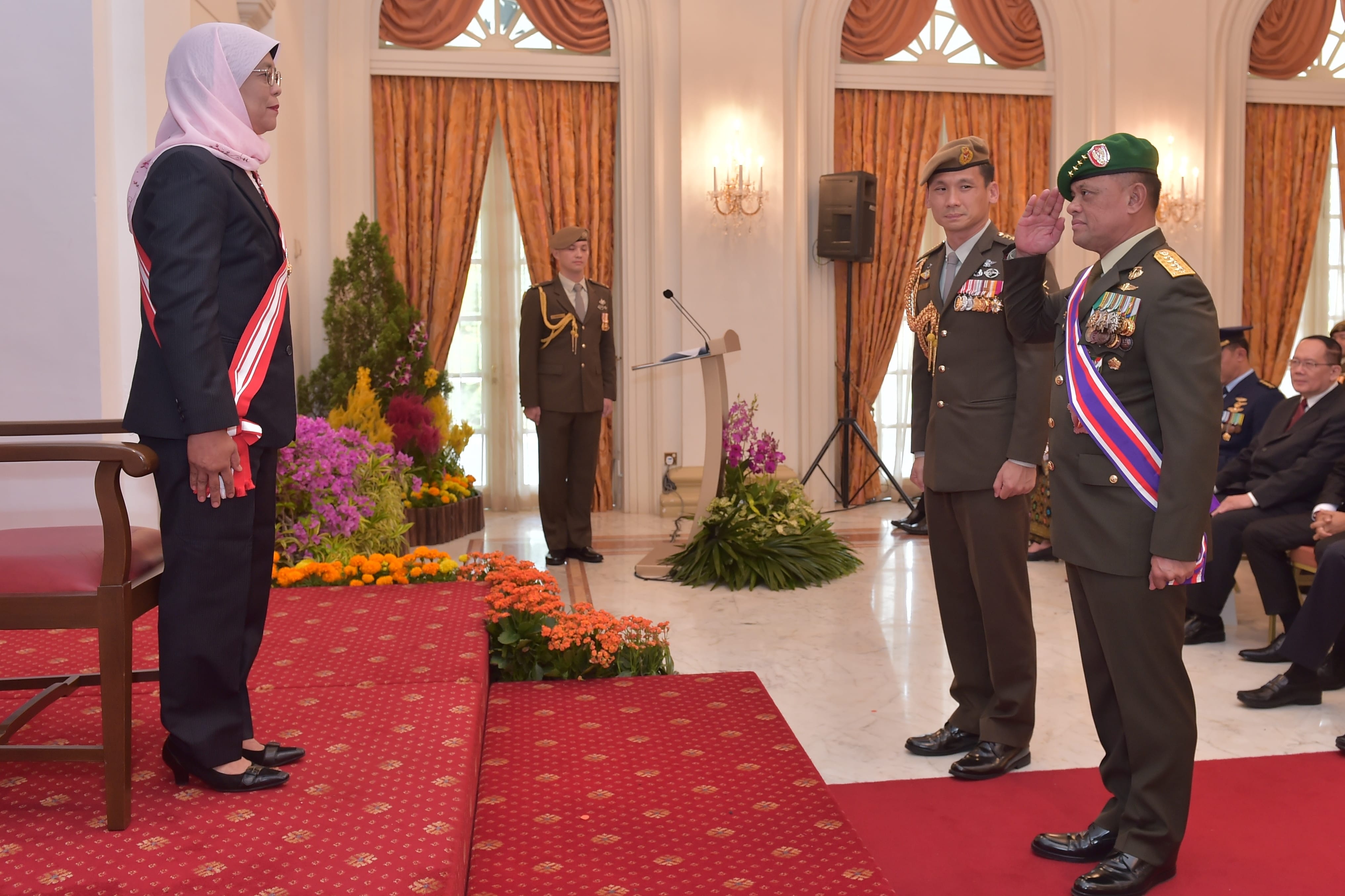 General (GEN) Gatot Nurmantyo (right) paying compliments after receiving the award from President Halimah Yacob (left) at the Istana.