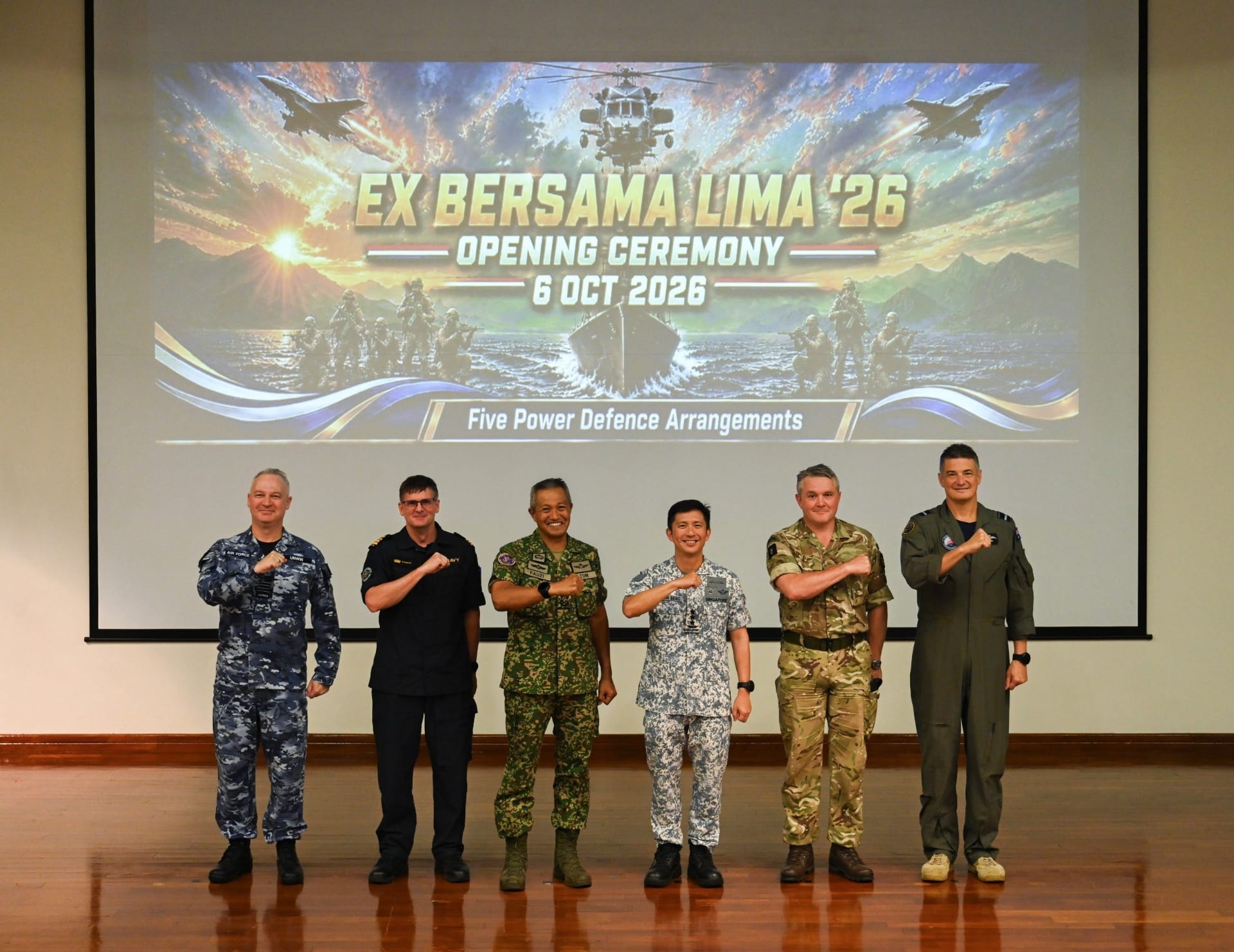 Singapore Chief of Defence Force (CDF) Vice Admiral Aaron Beng (third from right) officiating the opening ceremony of Exercise Bersama Lima 2026 (XBL26). In attendance are FPDA nation representatives (from left to right): Group Captain Sean Unwin (Australia), Commander Ian Andrew (New Zealand), Malaysian Joint Force Commander, Lieutenant General Dato’ Sri Tengku Muhammad Fauzi bin Tengku Ibrahim, Brigadier Jody Davies (United Kingdom), and Commander, Integrated Air Defence Systems (IADS), Air Vice Marshal Nathan Christie.