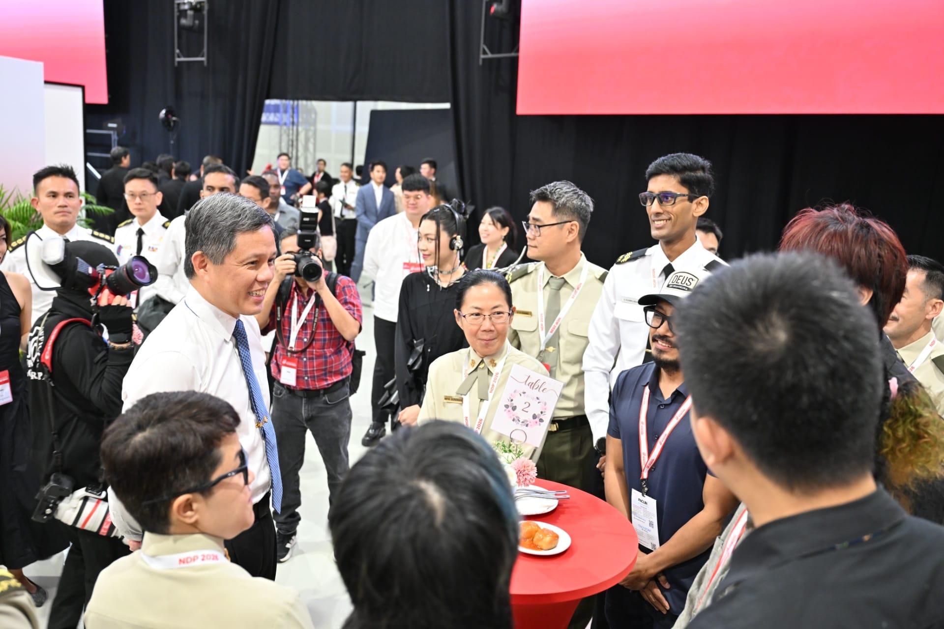 Minister Chan interacting with organisers, participating organisations and sponsors of NDP 2026.