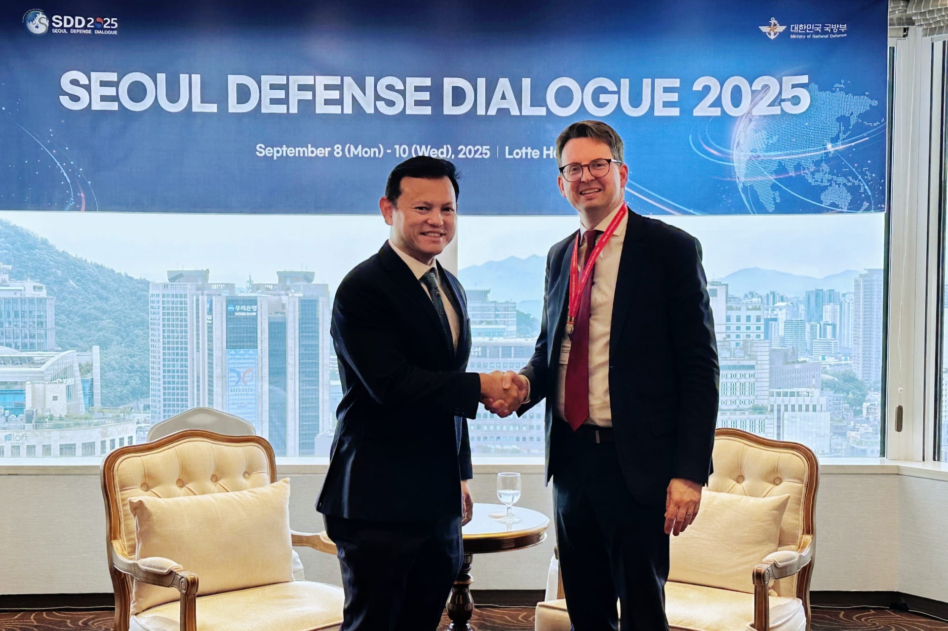 Mr Zaqy (left) meeting with Sweden State Secretary to Minister for Civil Defence Johan Berggren (right) at the sidelines