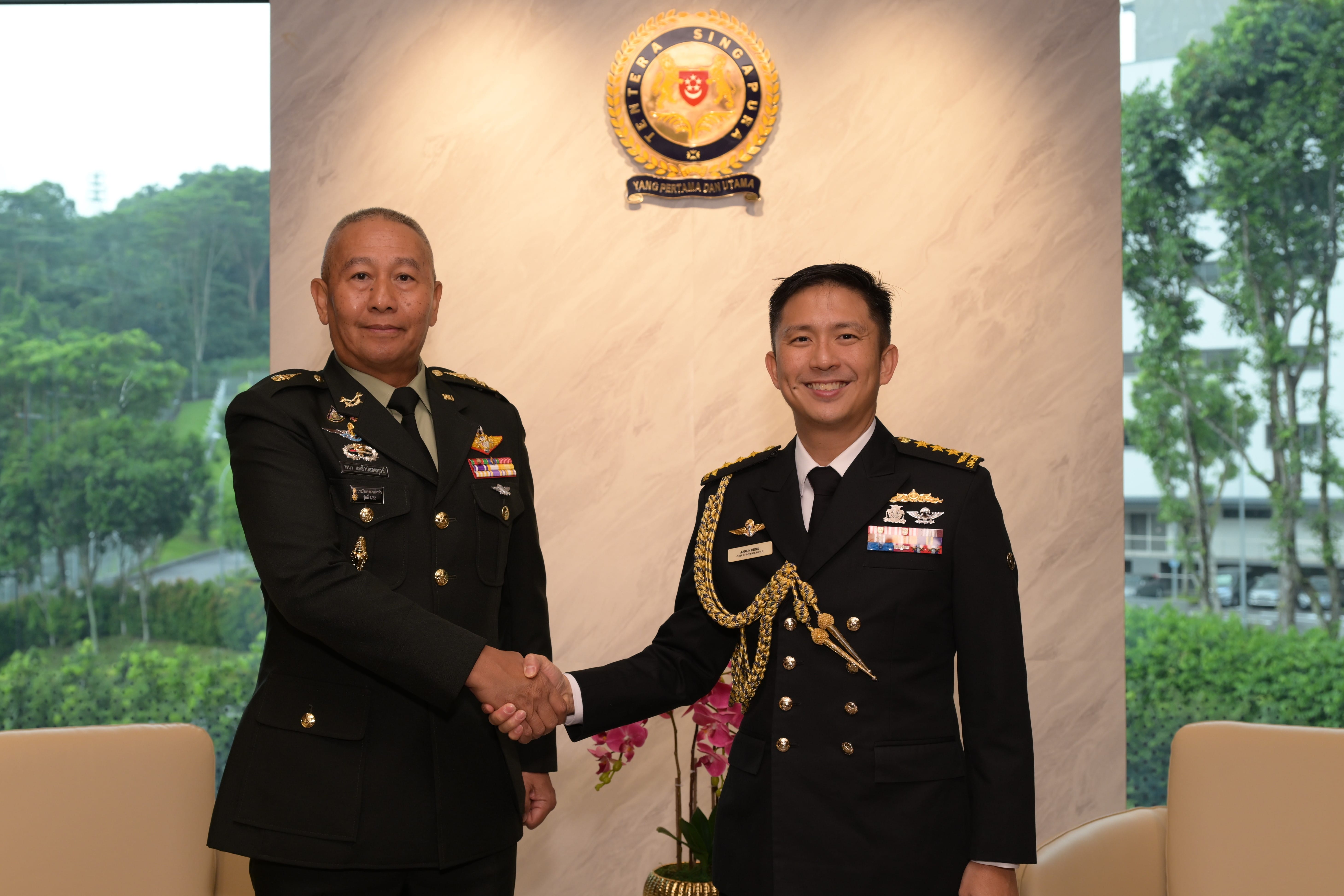 The Chief of Army, Royal Thai Army, General (GEN) Pana Claewplodtook (left), calling on Chief of Defence Force Vice Admiral Aaron Beng (right) at the Ministry of Defence (MINDEF) earlier today.