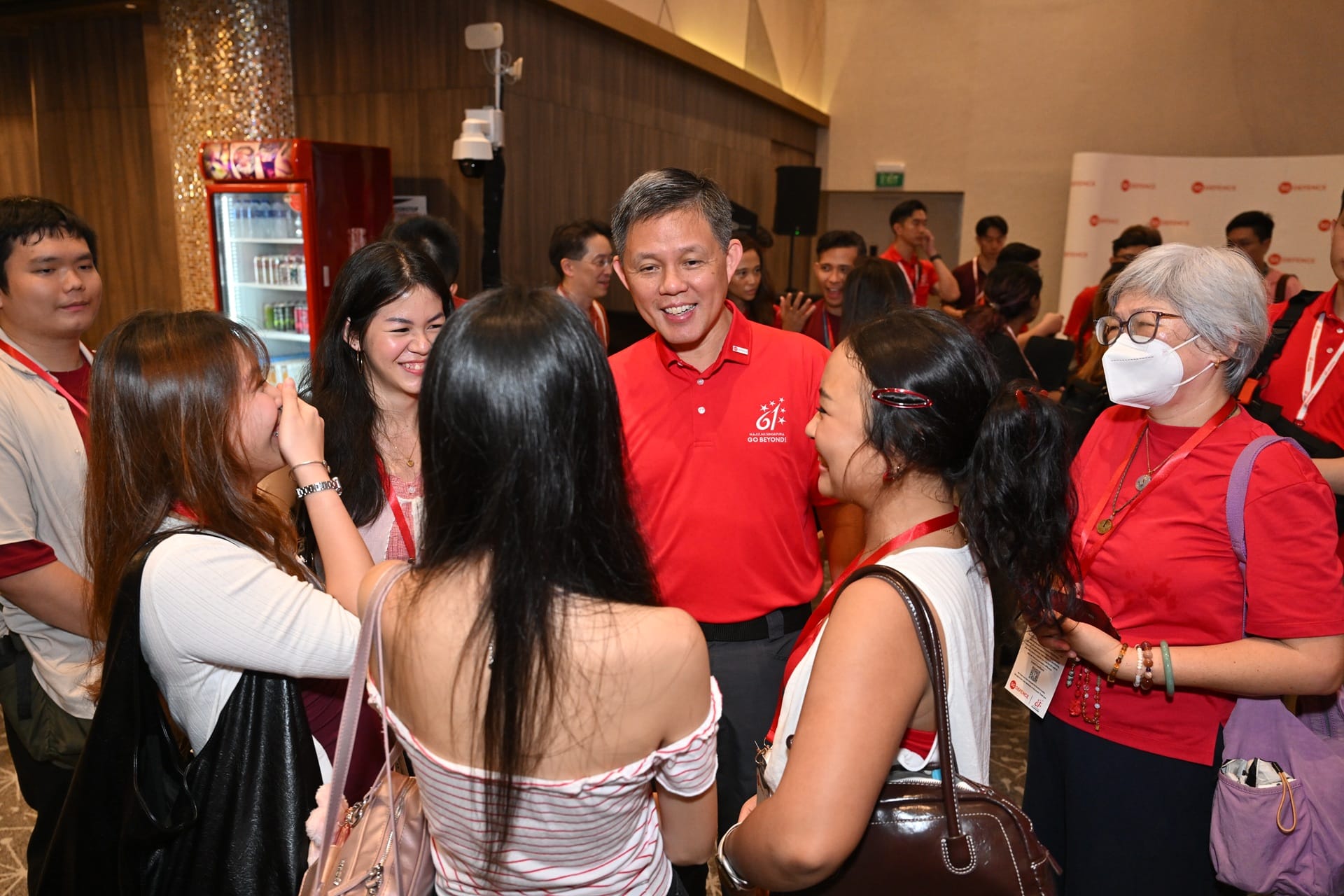 Mr Chan (centre) interacting with volunteers.
