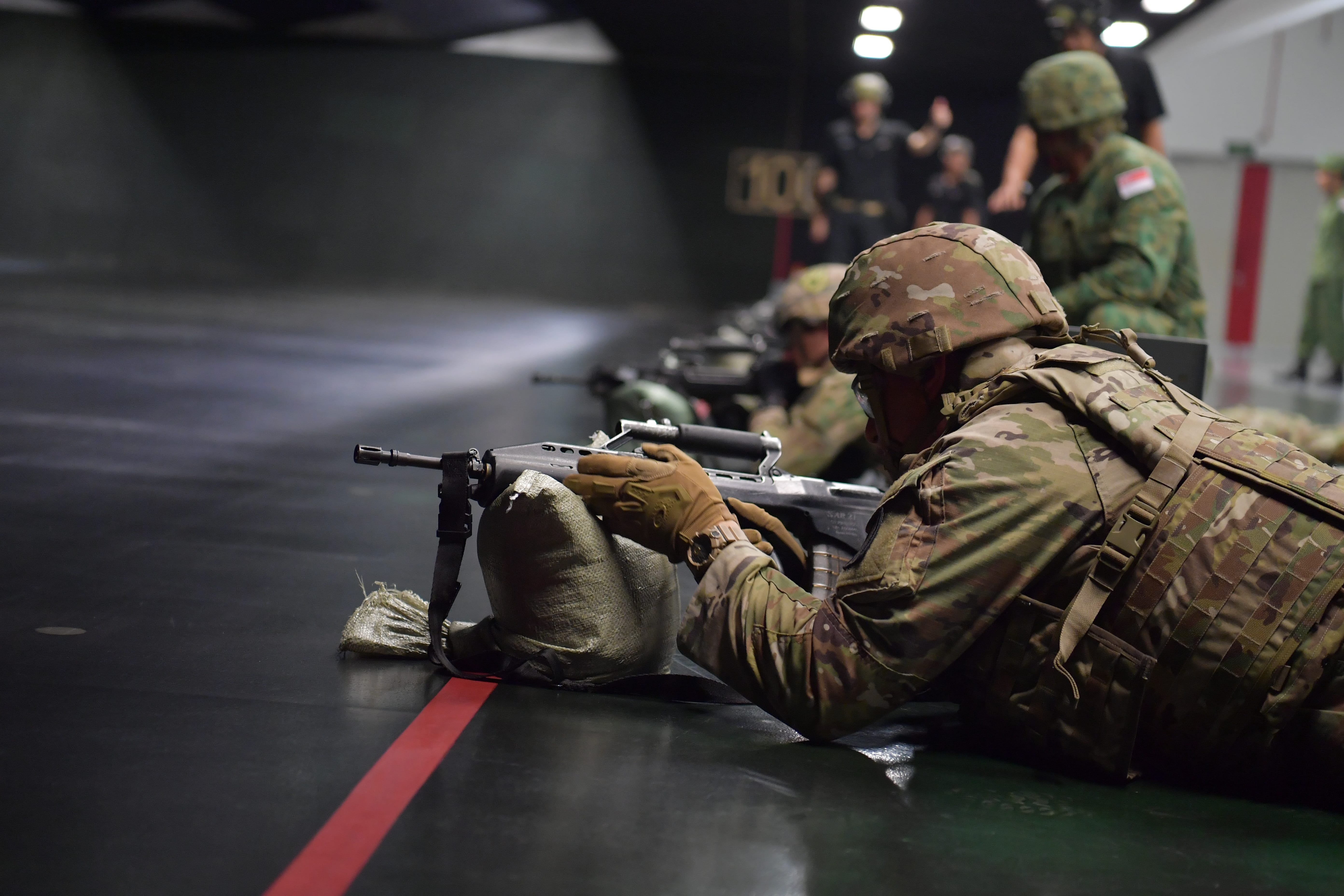 US Army soldier fires SAR-21 at Multi-Mission Range Complex.