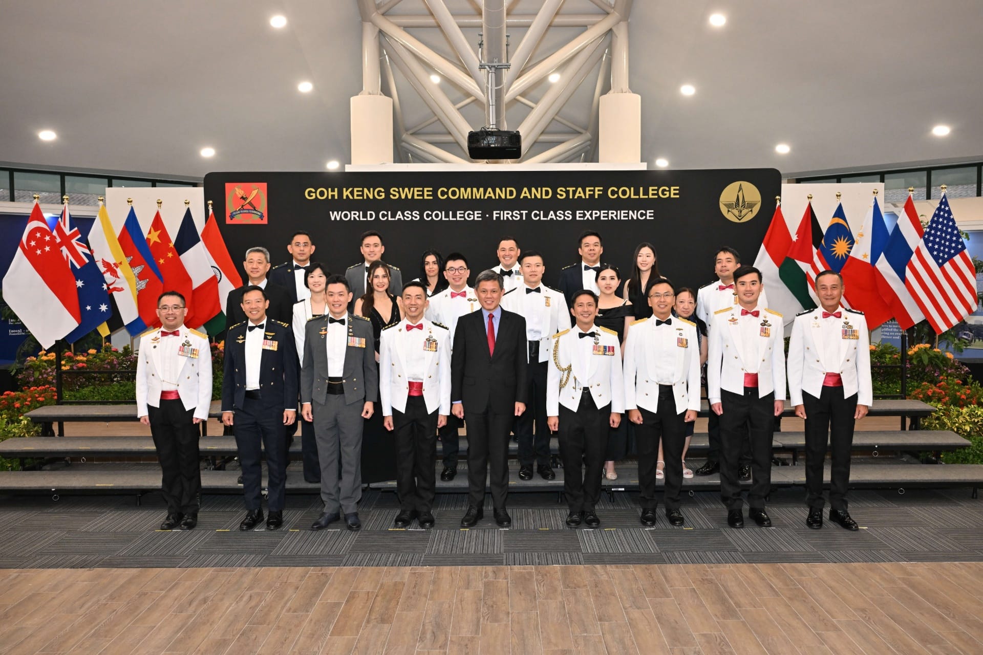 Mr Chan in a group photo with top graduates.