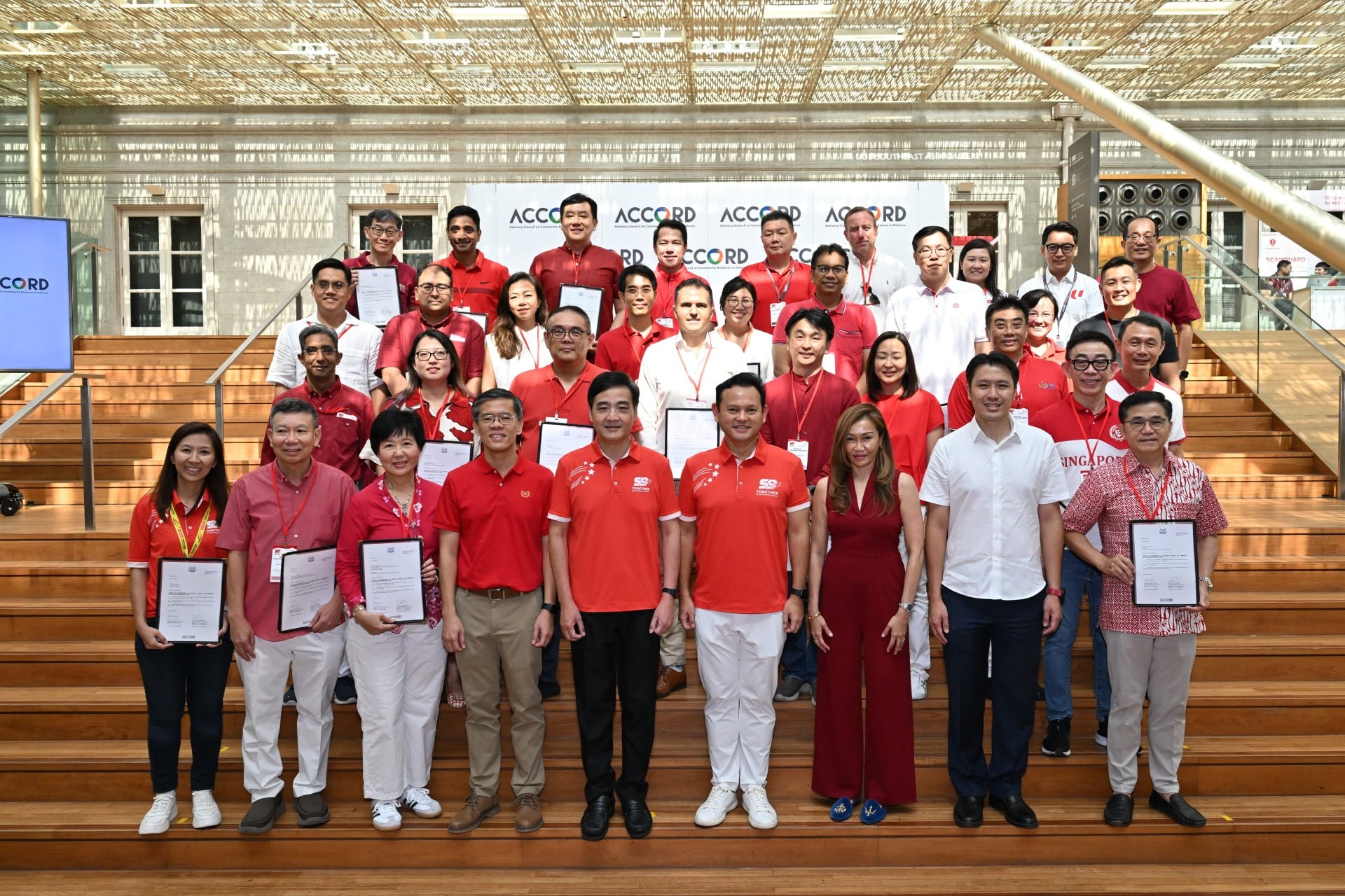 SMS Heng and SMS Zaqy Mohamad taking a group photo with the incoming ACCORD members.
