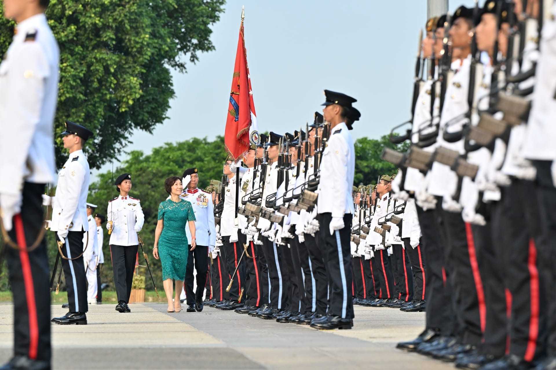 Minister for Sustainability and the Environment and Minister-in-charge of Trade Relations, Ms Grace Fu reviewing the contingents at the 141st Officer Cadet Commissioning Parade this evening.