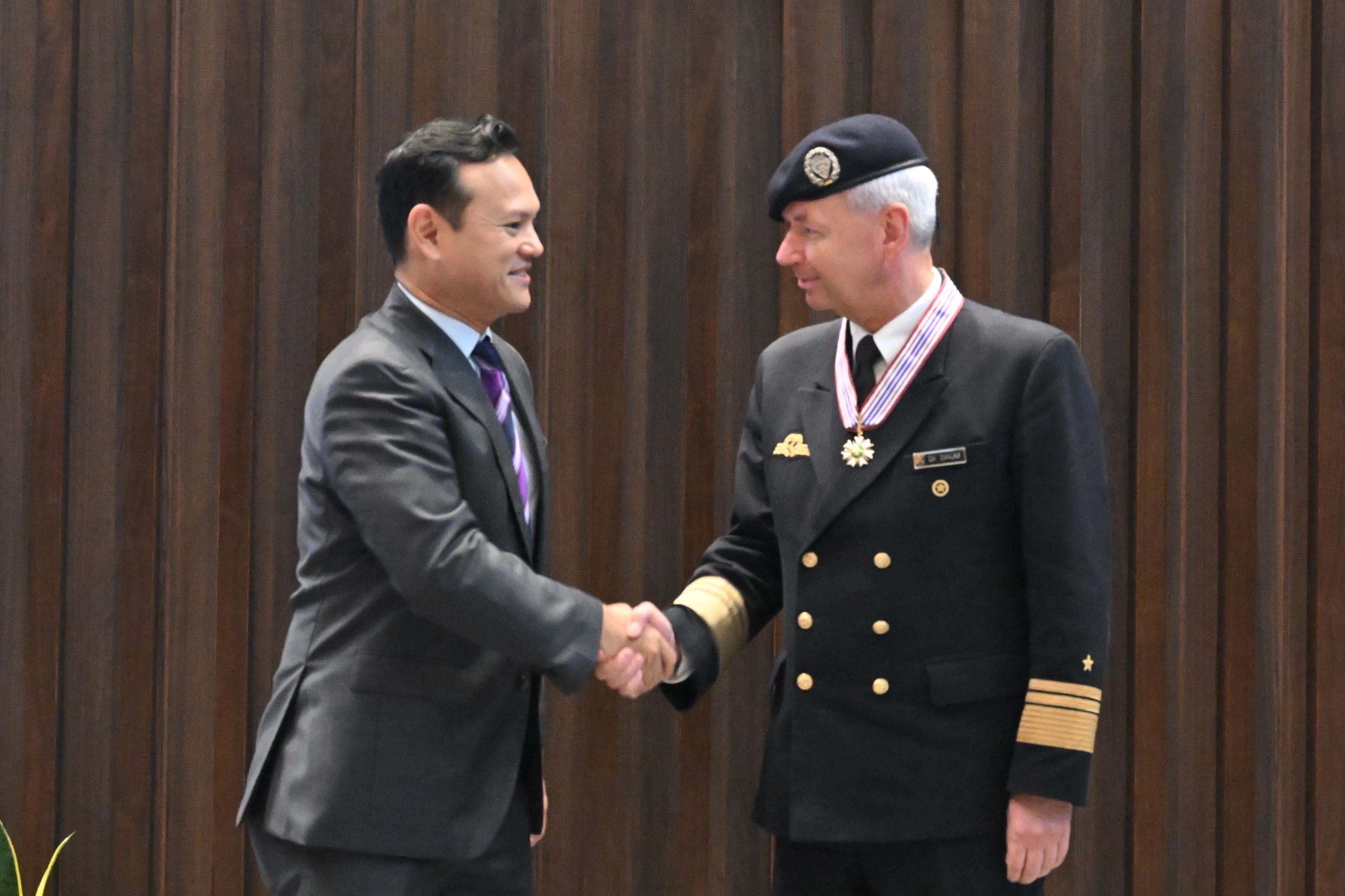 German Chief of Cyber and Information Domain Service Vice Admiral (VADM) Dr. Thomas Daum (right) was presented the Meritorious Service Medal (Military) by Senior Minister of State for Defence Mr Zaqy Mohamad (left) at the Ministry of Defence (MINDEF) this afternoon.