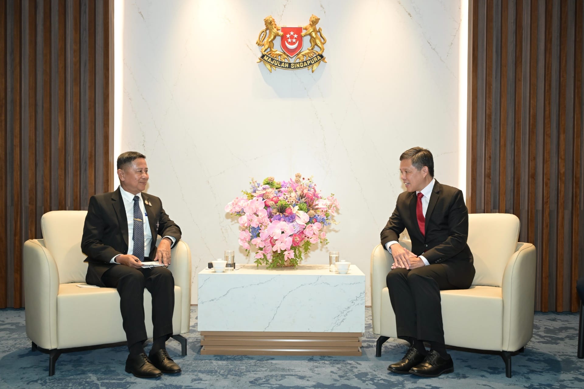 Lieutenant General (LTG) Adul Boonthumjaroen (left) calling on Minister for Defence, Mr Chan Chun Sing (right).