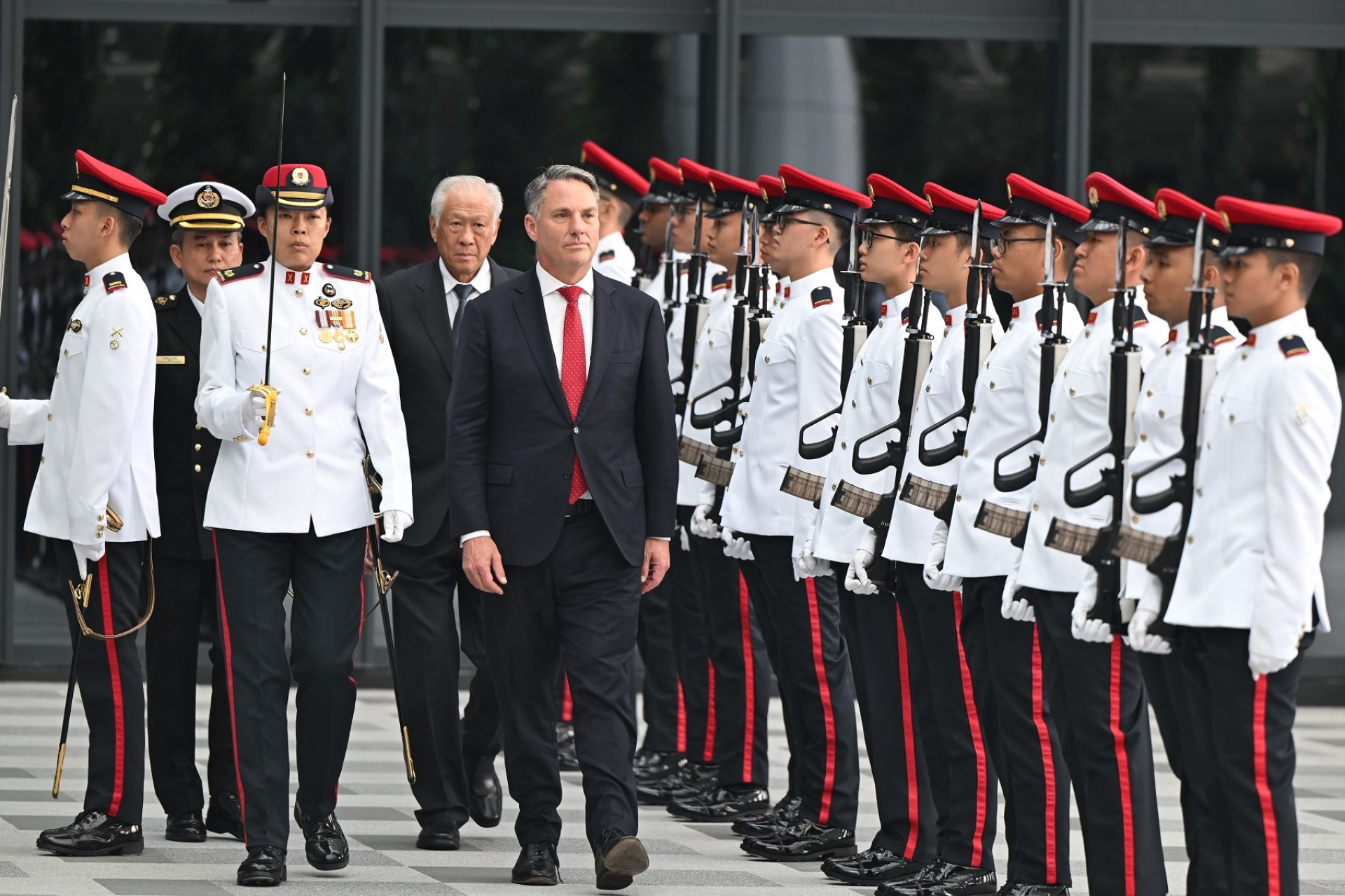 Mr Marles inspecting the Guard of Honour at MINDEF.
