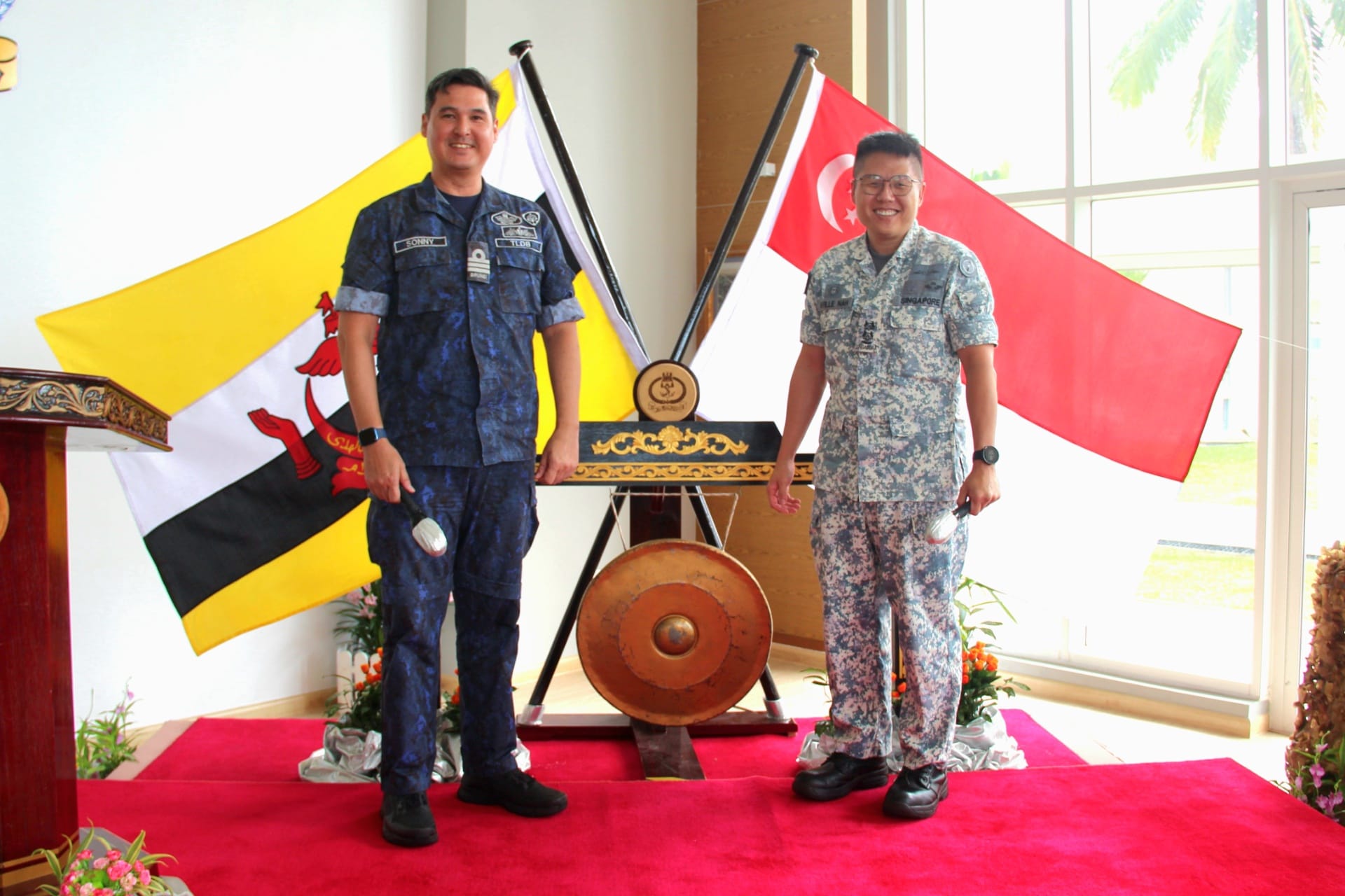 The RSN’s Maritime Security and Response Flotilla Commander, Senior Lieutenant Colonel Neville Nah (right) at the openin
