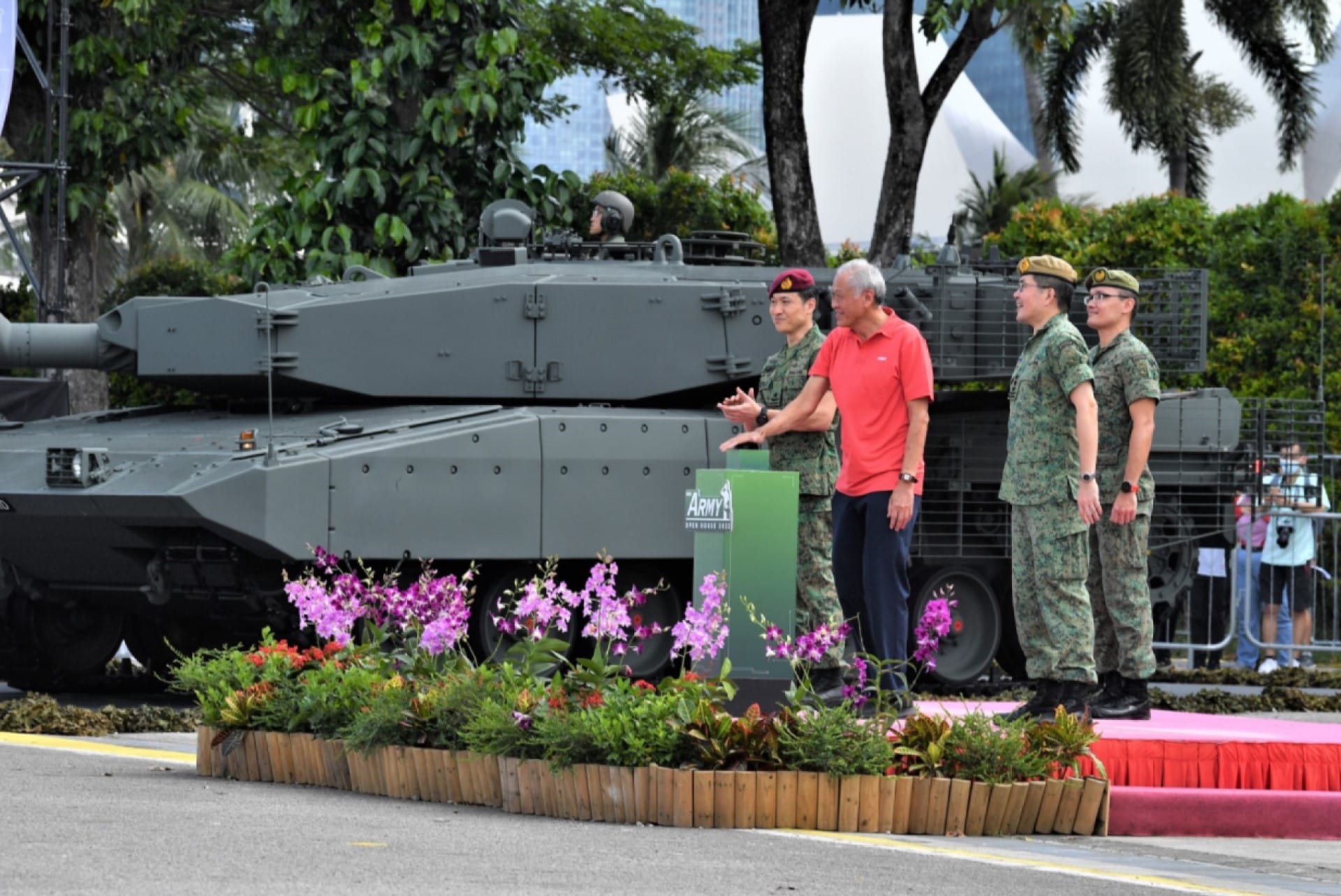 Minister for Defence Dr Ng Eng Hen (second from left), accompanied by Chief of Defence Force Lieutenant-General (LG) Melvyn Ong (second from right) and Chief of Army Brigadier-General (BG) David Neo (most left), launched the Army Open House 2022 (AOH22) at the F1 Pit Building earlier today.