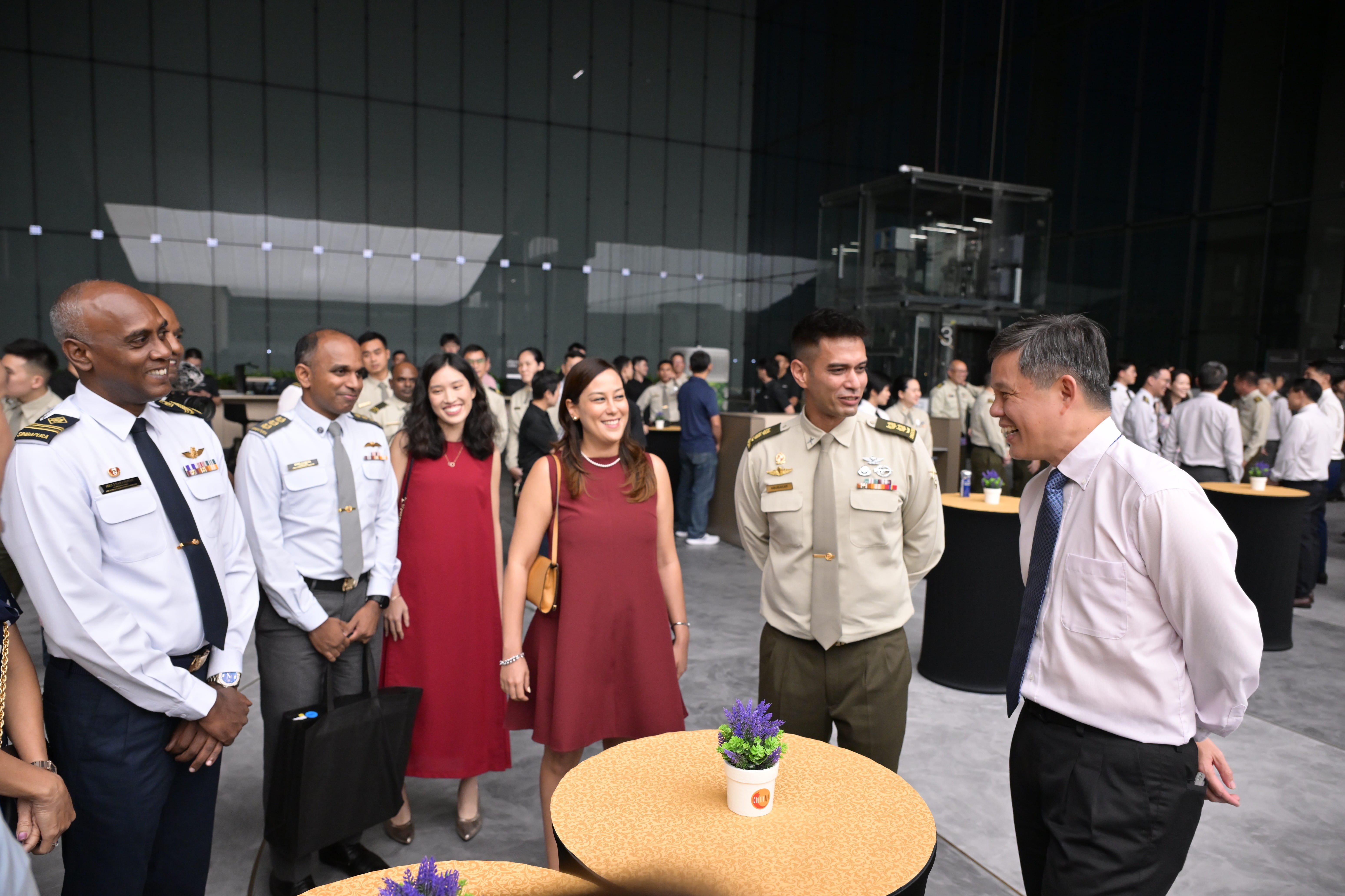 Mr Chan interacting with promotees and guests after the ceremony at CMPB.