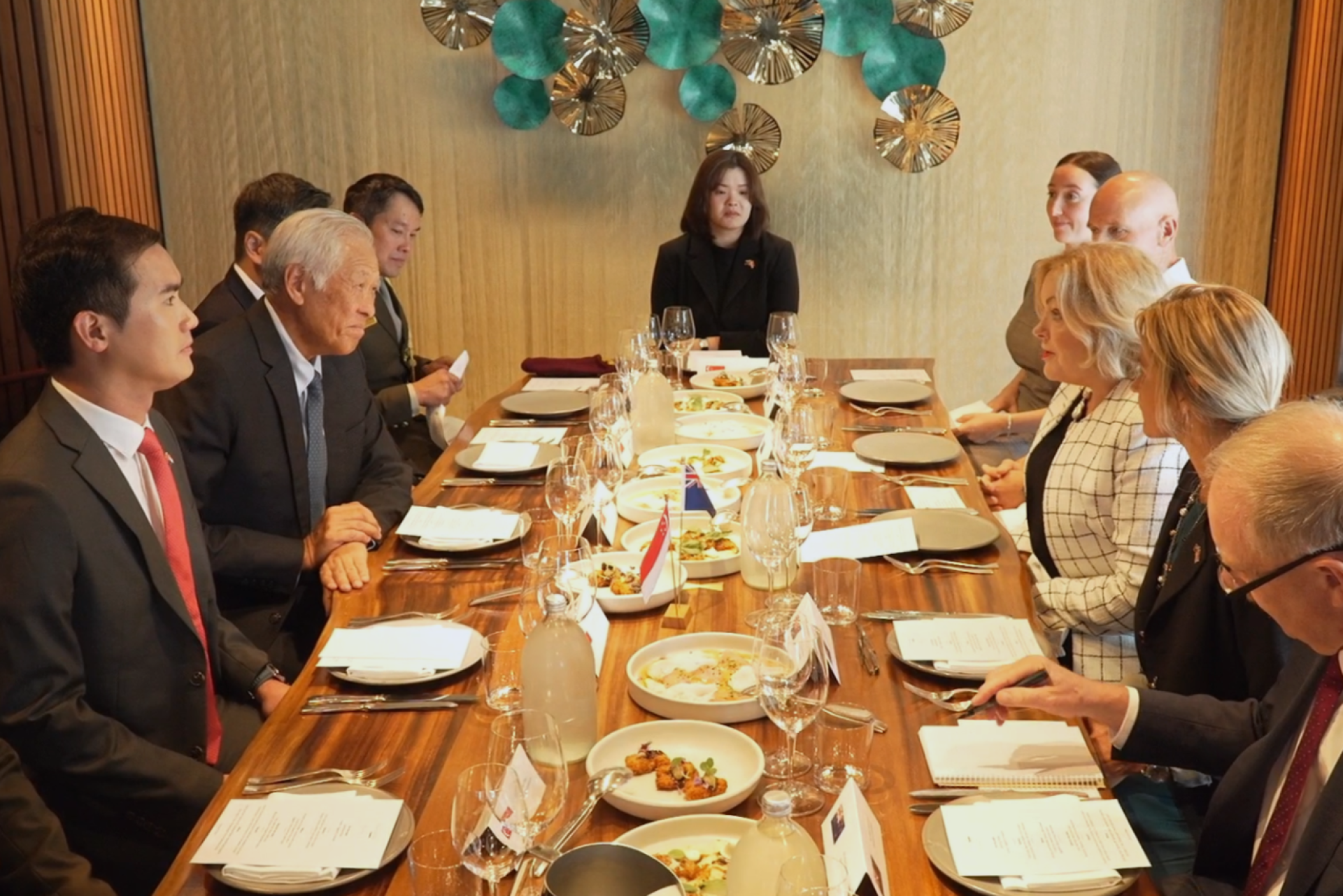 Dr Ng and Minister Collins co-chairing the fourth Singapore-New Zealand Defence Ministers' Meeting over lunch.