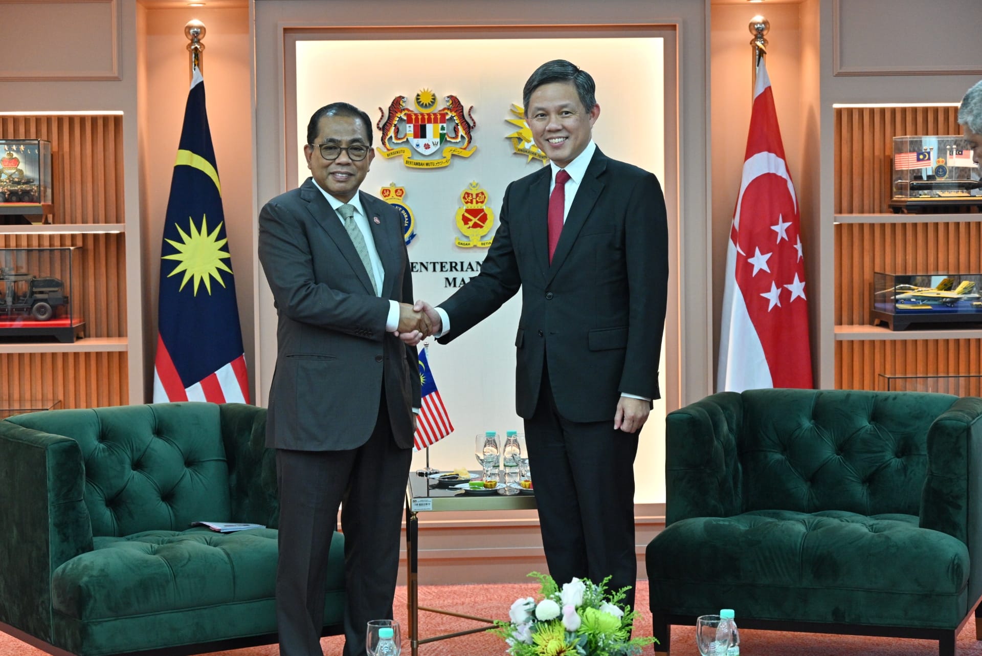 Minister for Defence Mr Chan Chun Sing (right) calling on Malaysian Minister of Defence Dato’ Seri Mohamed Khaled...