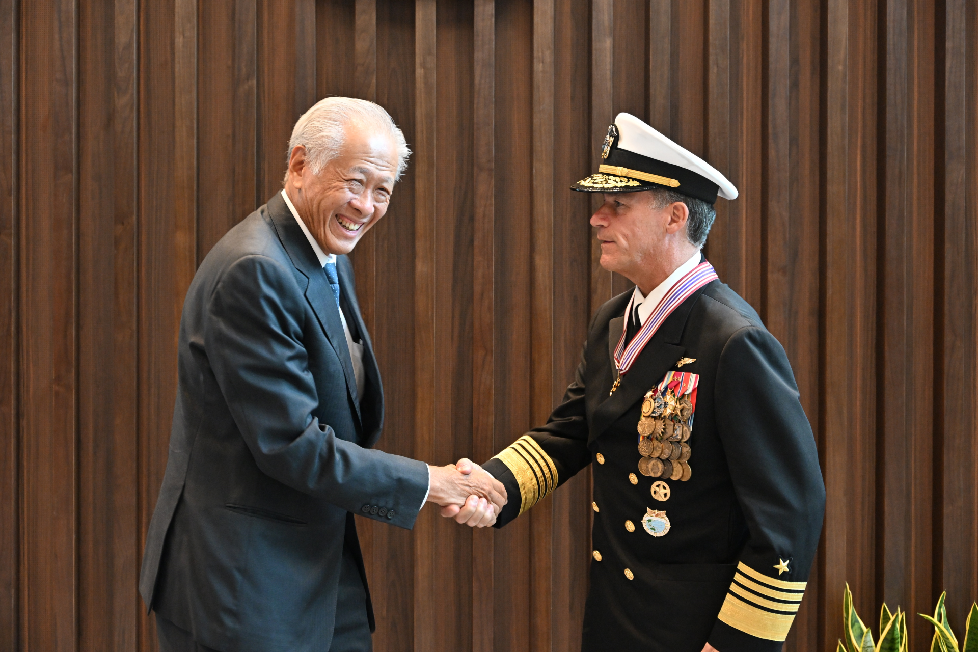 Commander of the United States Indo-Pacific Command (US INDOPACOM) Admiral John Christopher Aquilino (right) was presented the Meritorious Service Medal (Military) by Minister for Defence Dr Ng Eng Hen (left) at the Ministry of Defence (MINDEF).