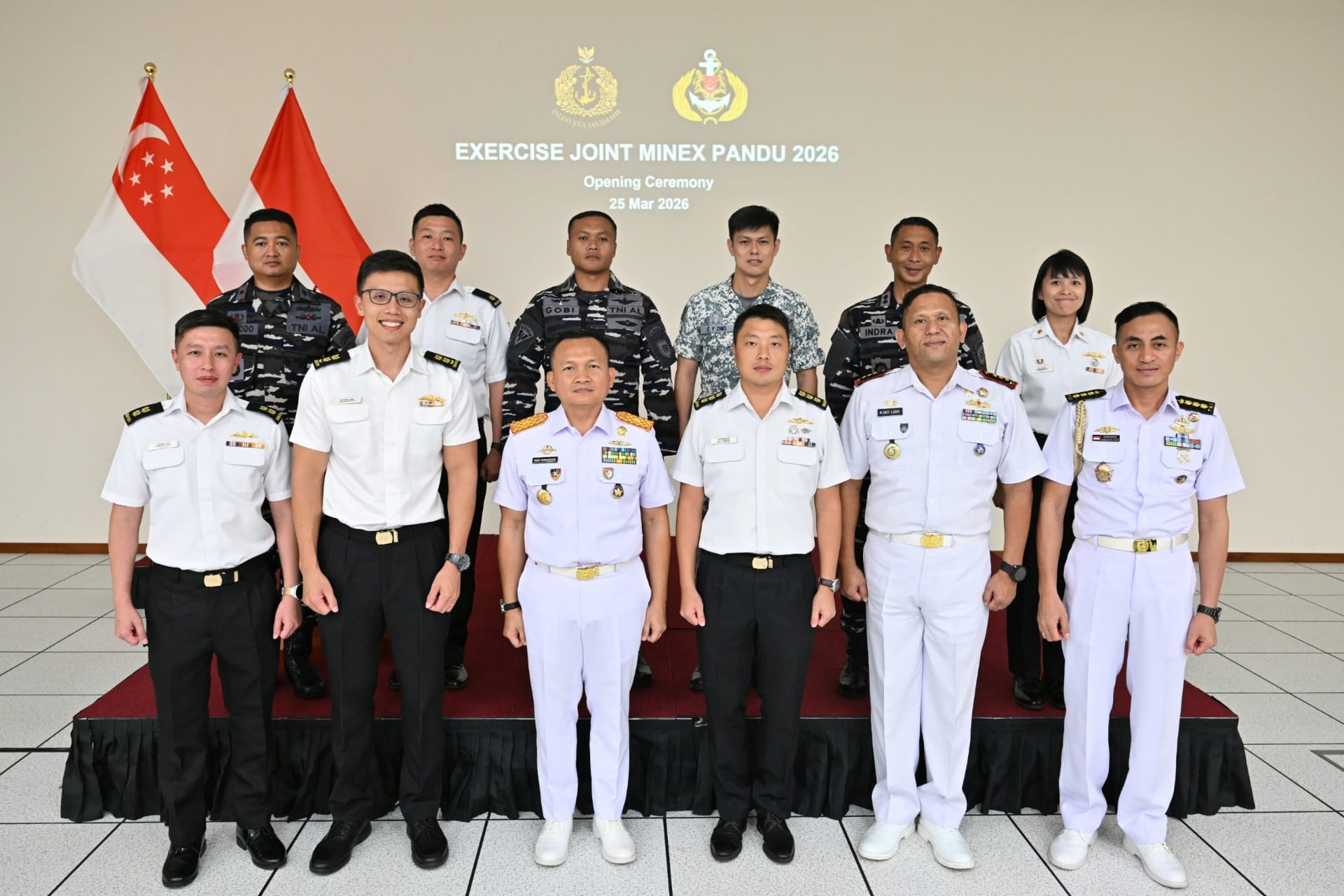 Deputy Commander MARSEC Command RSN, Colonel Bertram Ang (front row, 3rd from right) and Commander of Sea Security Task Force, First Fleet Command TNI AL First Admiral Dedi Komarudin (front row, 3rd from left) with exercise Key Appointment Holders from both navies at the opening ceremony.