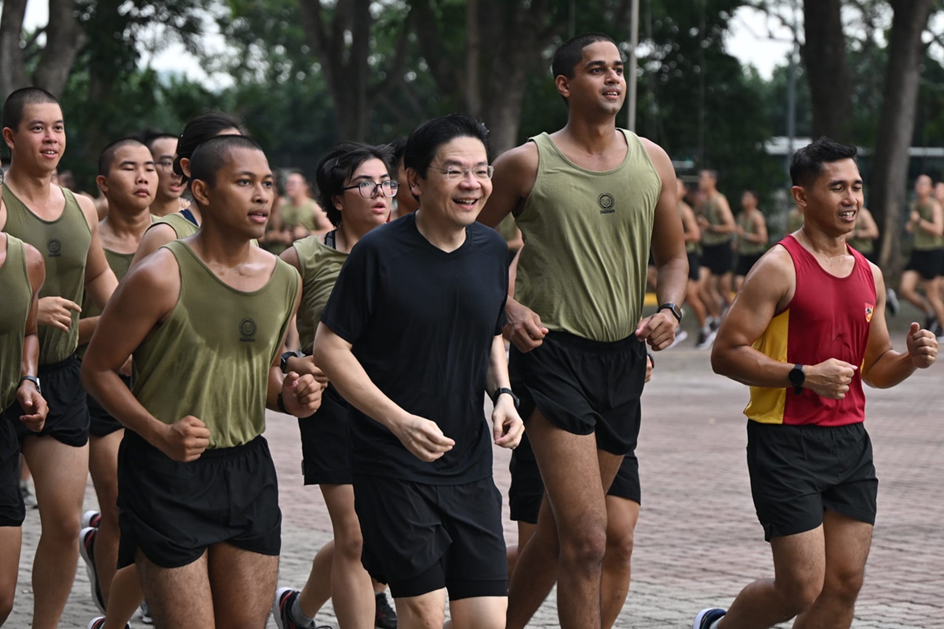 Prime Minister (PM) and Minister for Finance Mr Lawrence Wong participating in a run with recruits at the Singapore Armed Forces (SAF) Basic Military Training Centre (BMTC).