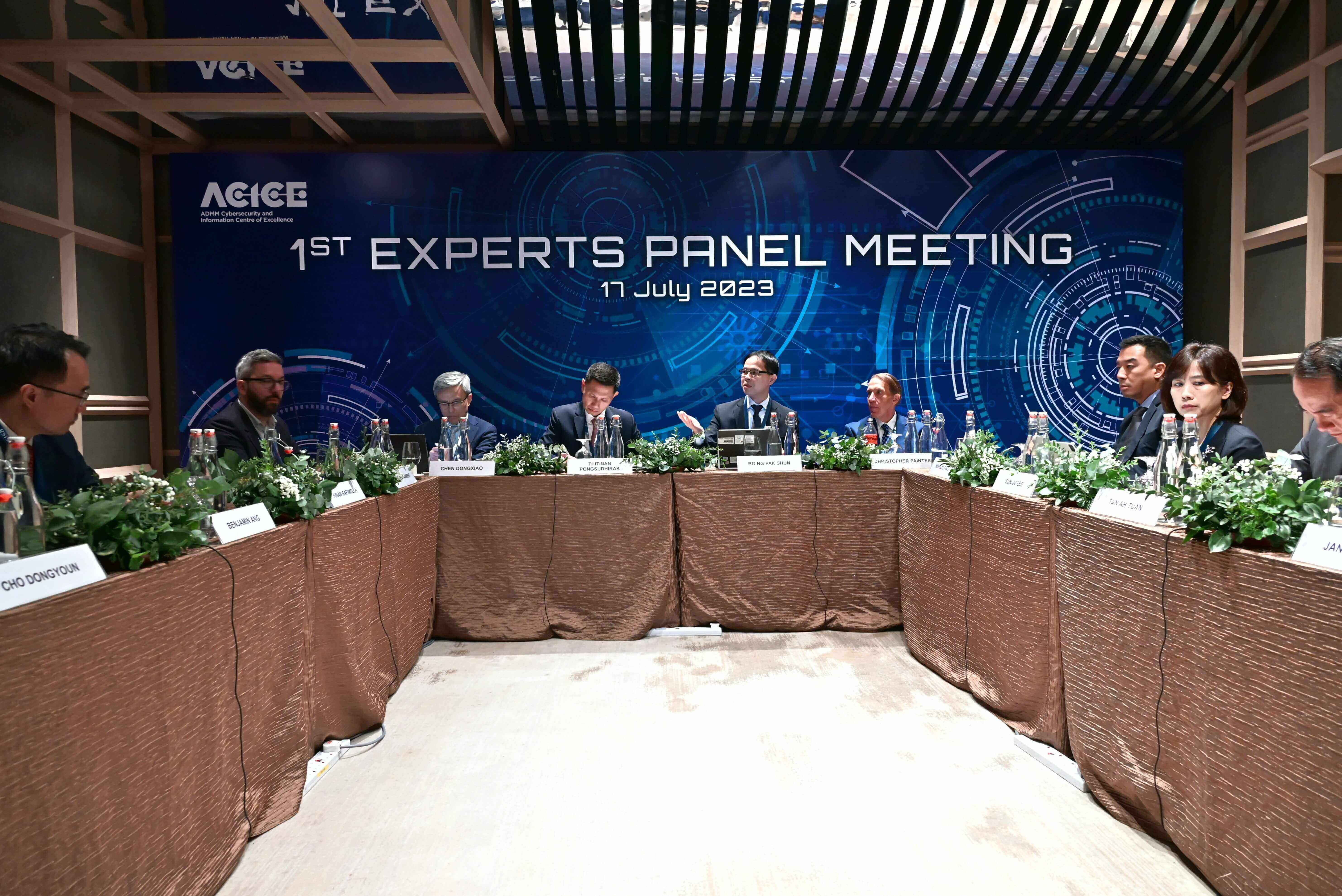 Members of the ACICE Experts Panel in a discussion during the inaugural Experts Panel Meeting on 17 July 2023.