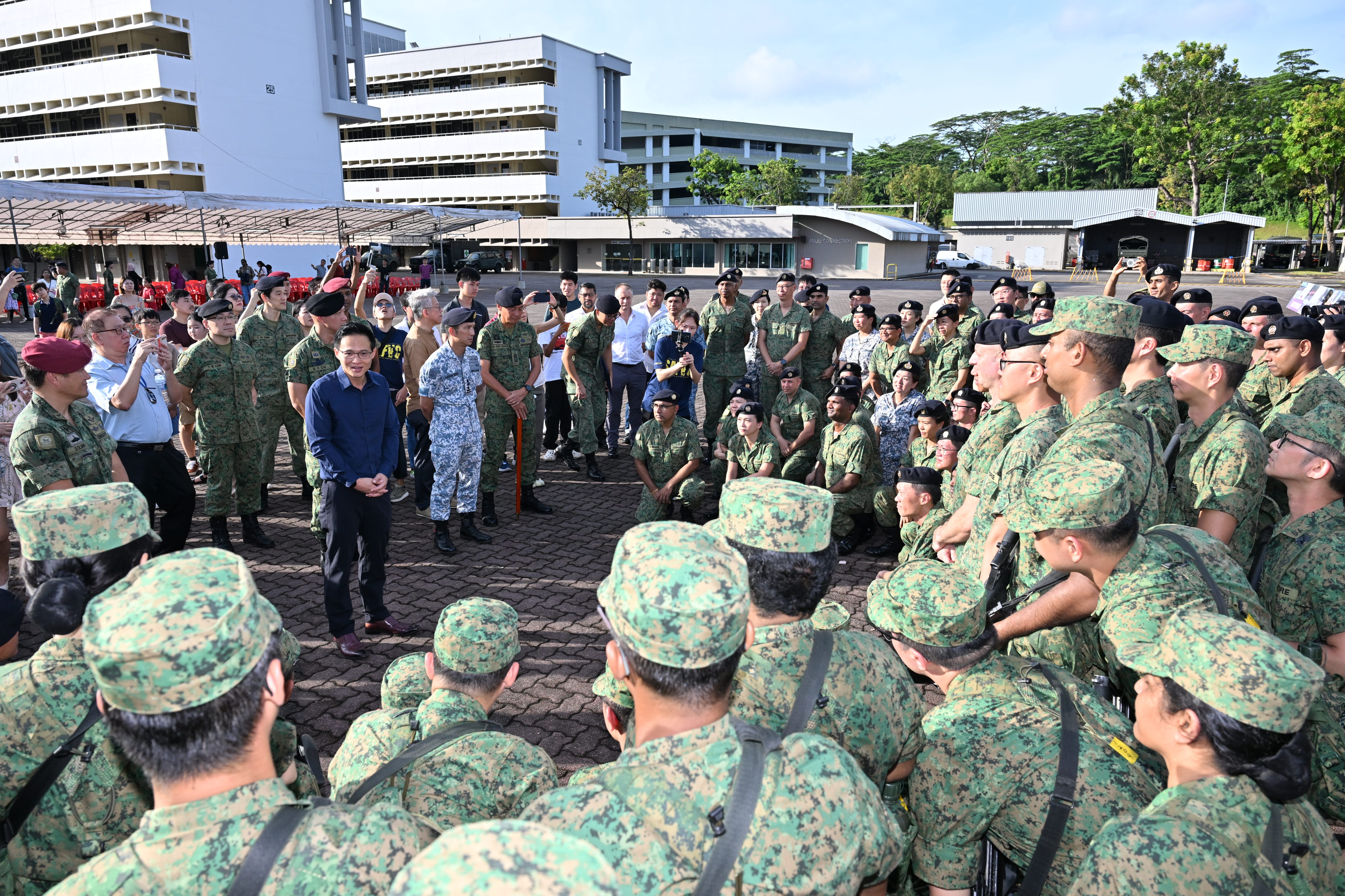 MOS Choo engaging the parade participants after the Milestone Parade.