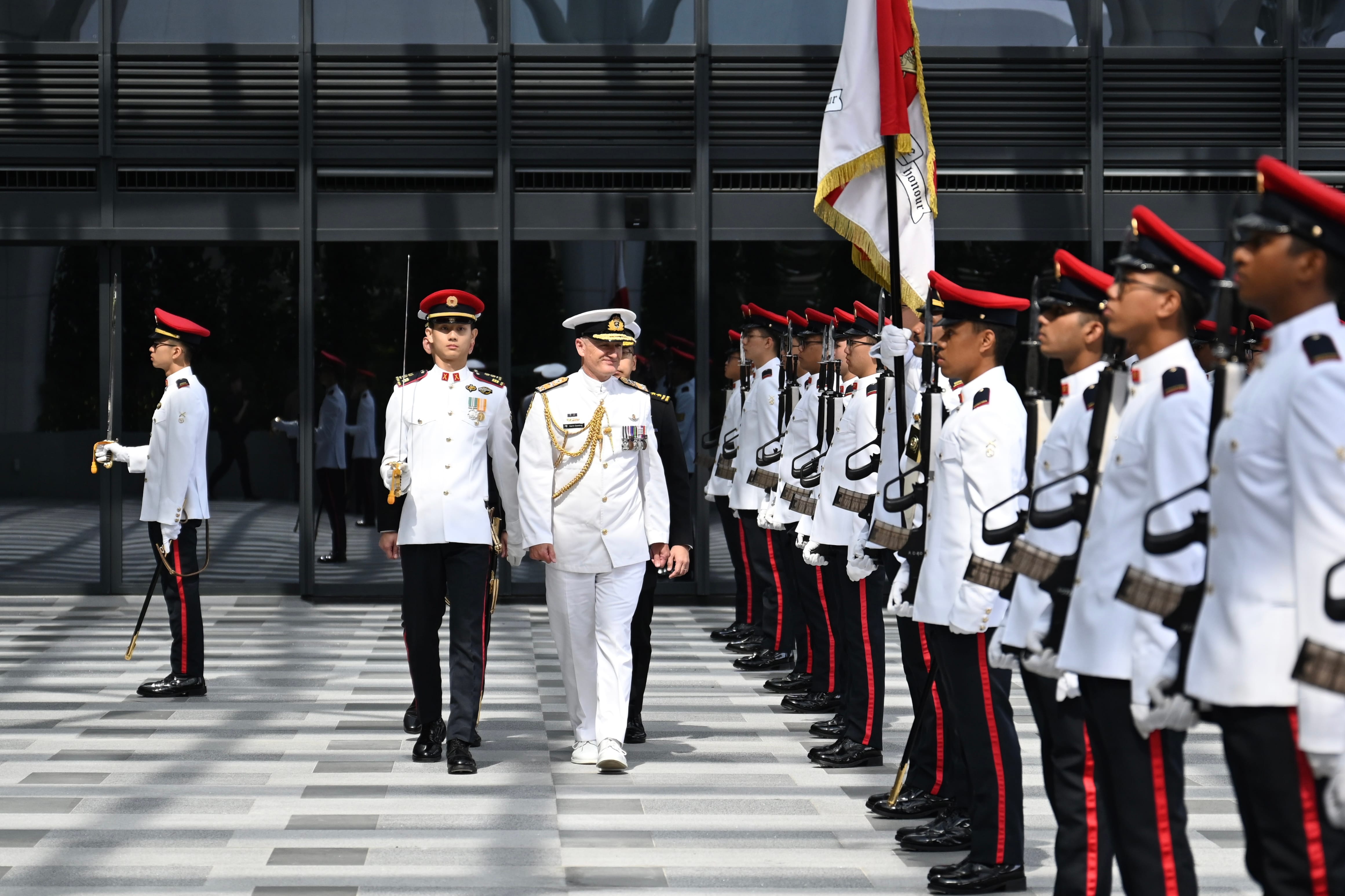 RADM Golding inspecting the Guard of Honour at the Ministry of Defence earlier
today.