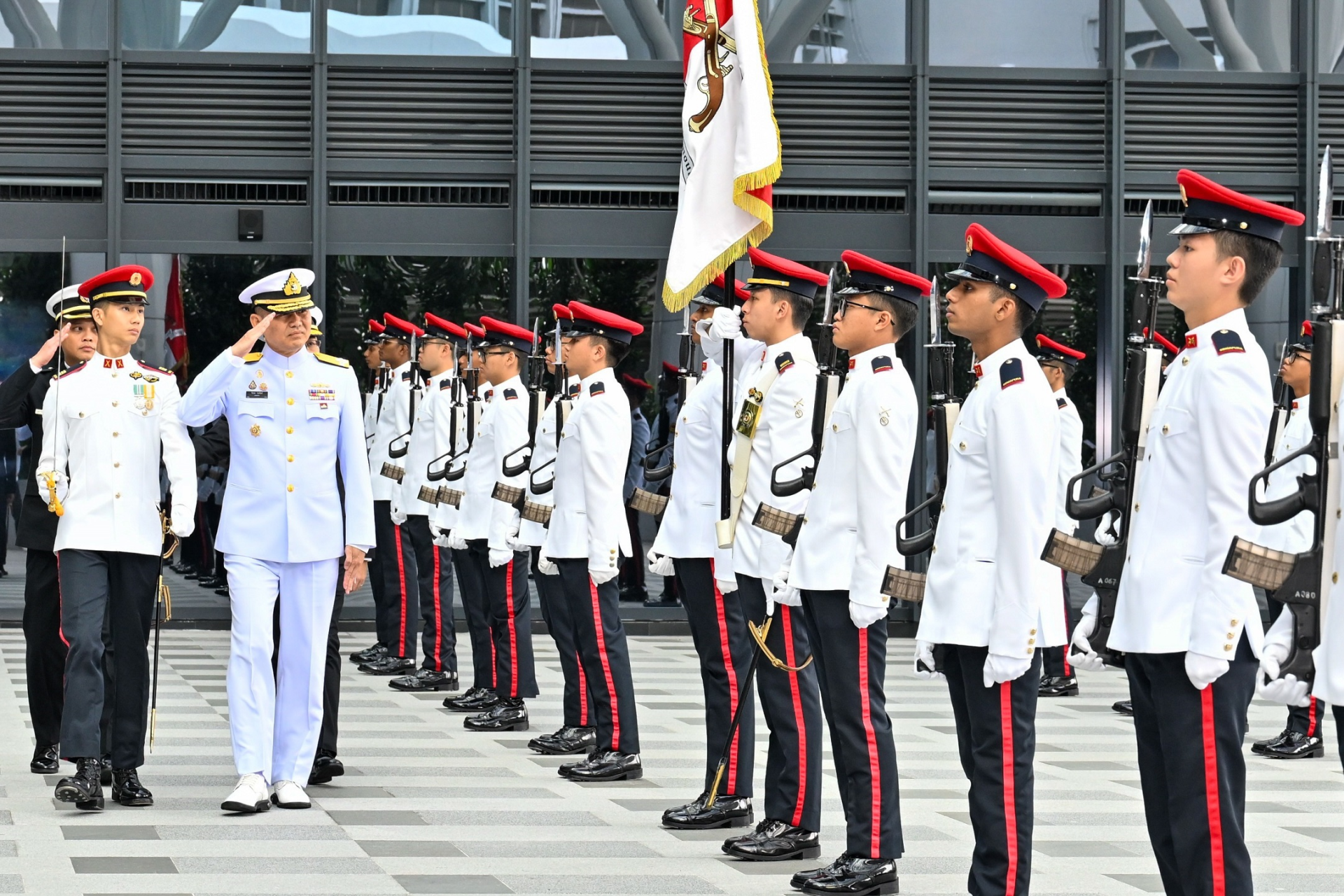 ADM Jirapol inspecting the Guard of Honour at the Ministry of Defence.