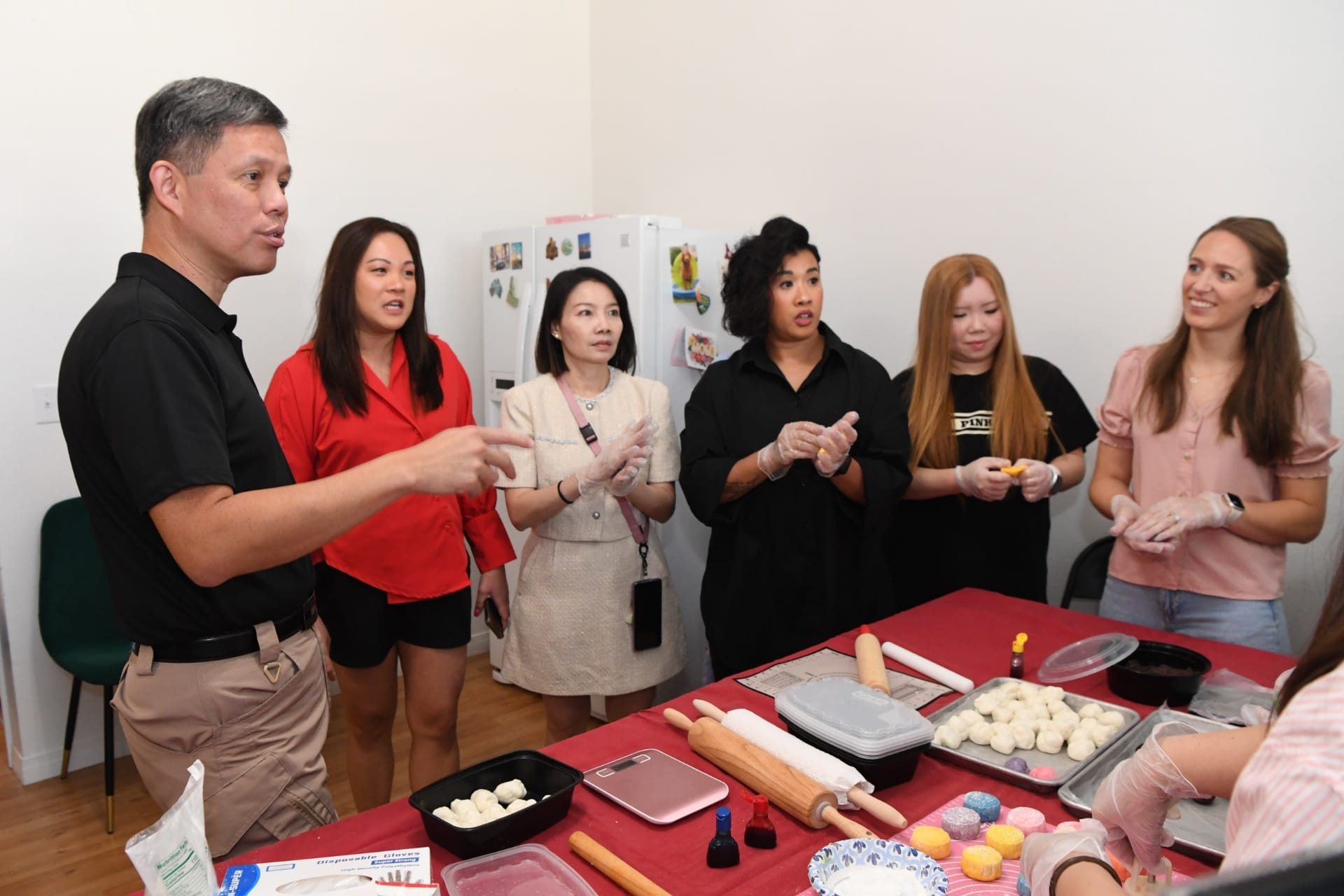 Mr Chan meeting with the family members of personnel from the Peace Carvin V Detachment.