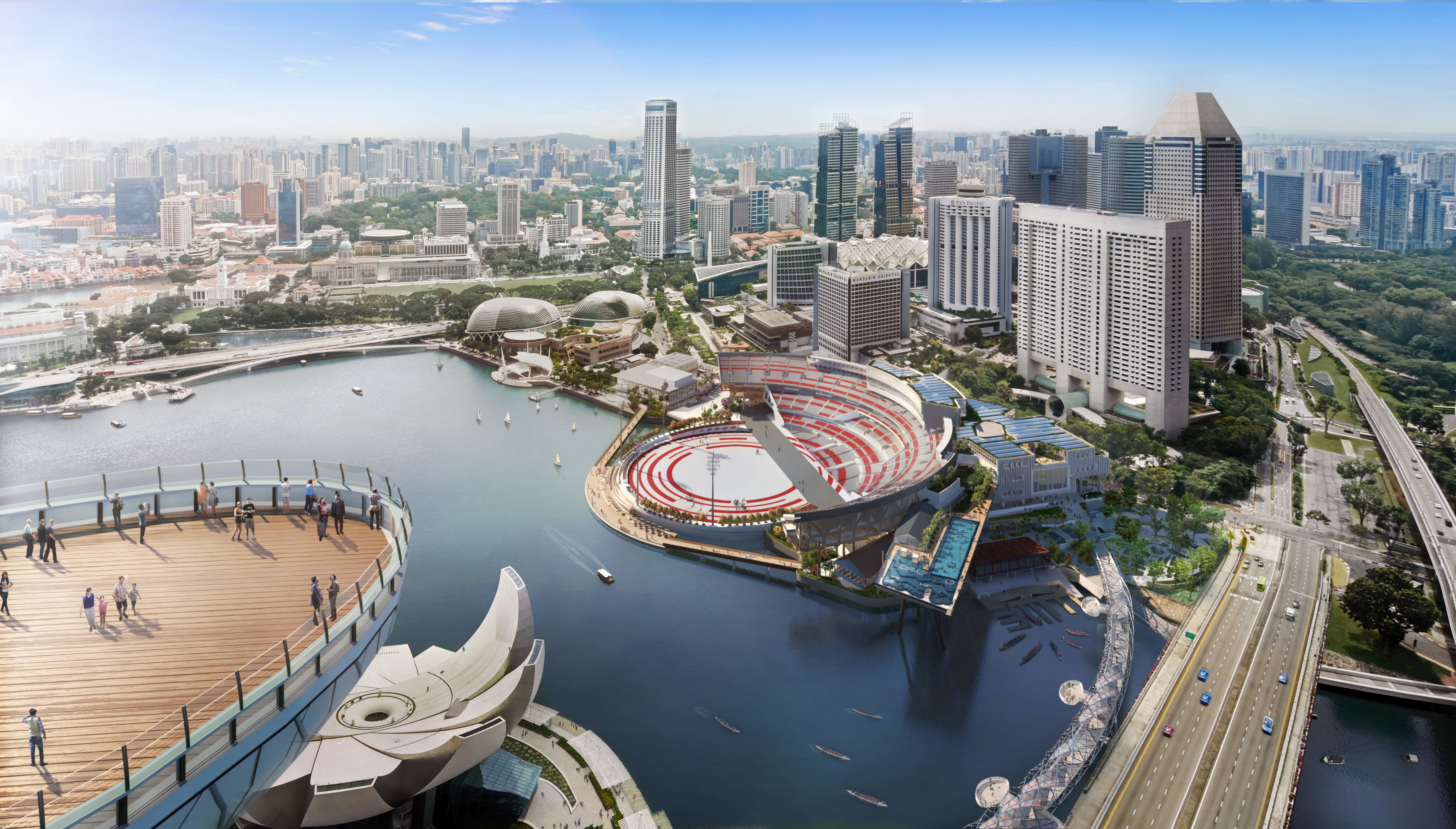 Aerial view of future NS Square featuring a stadium, waterfront, and city skyline backdrop.