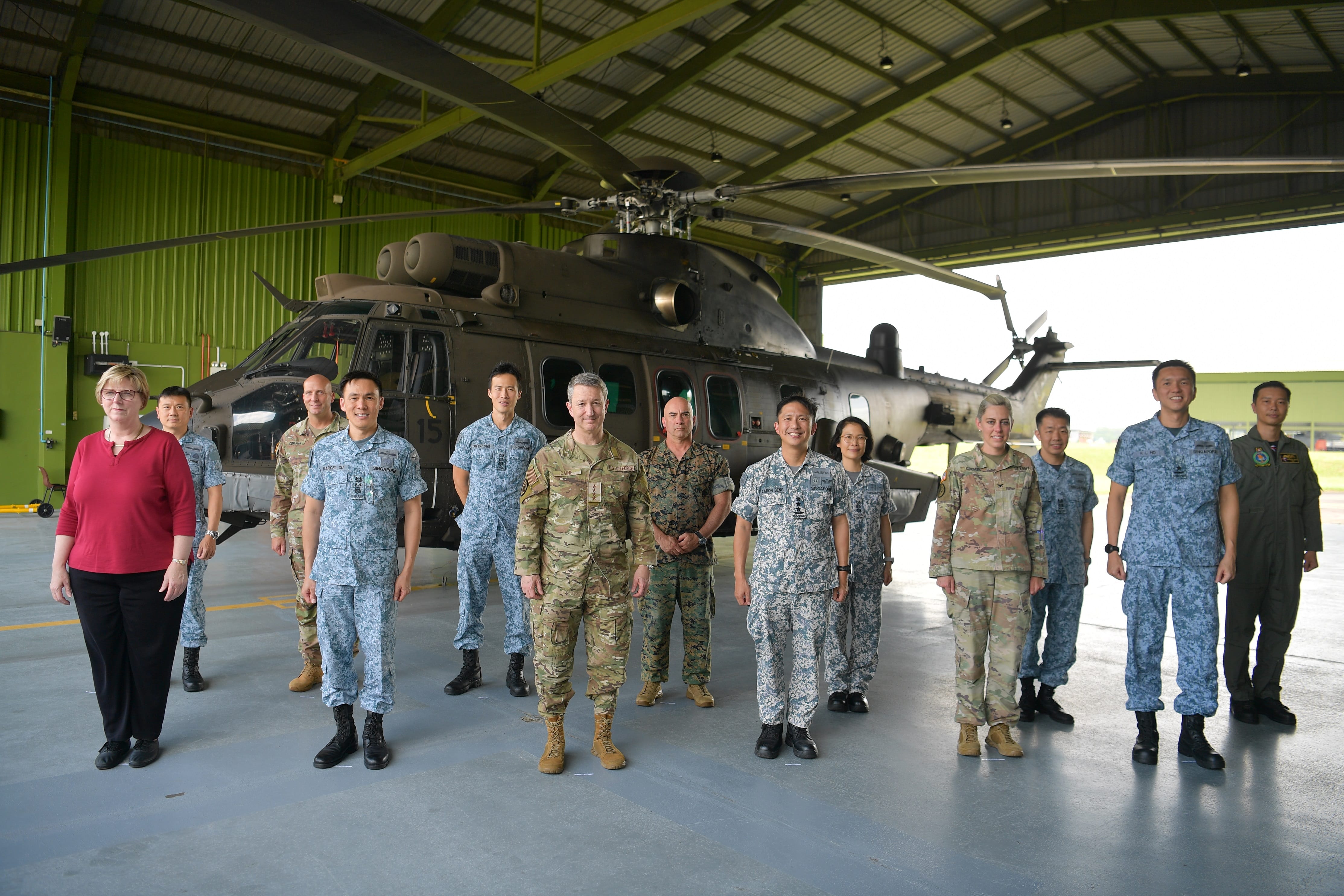 Chief of Defence Force, Vice Admiral Aaron Beng (front row, third from right) and GEN Caine (front row, third from left) at the visit to Sembawang Air Base yesterday.