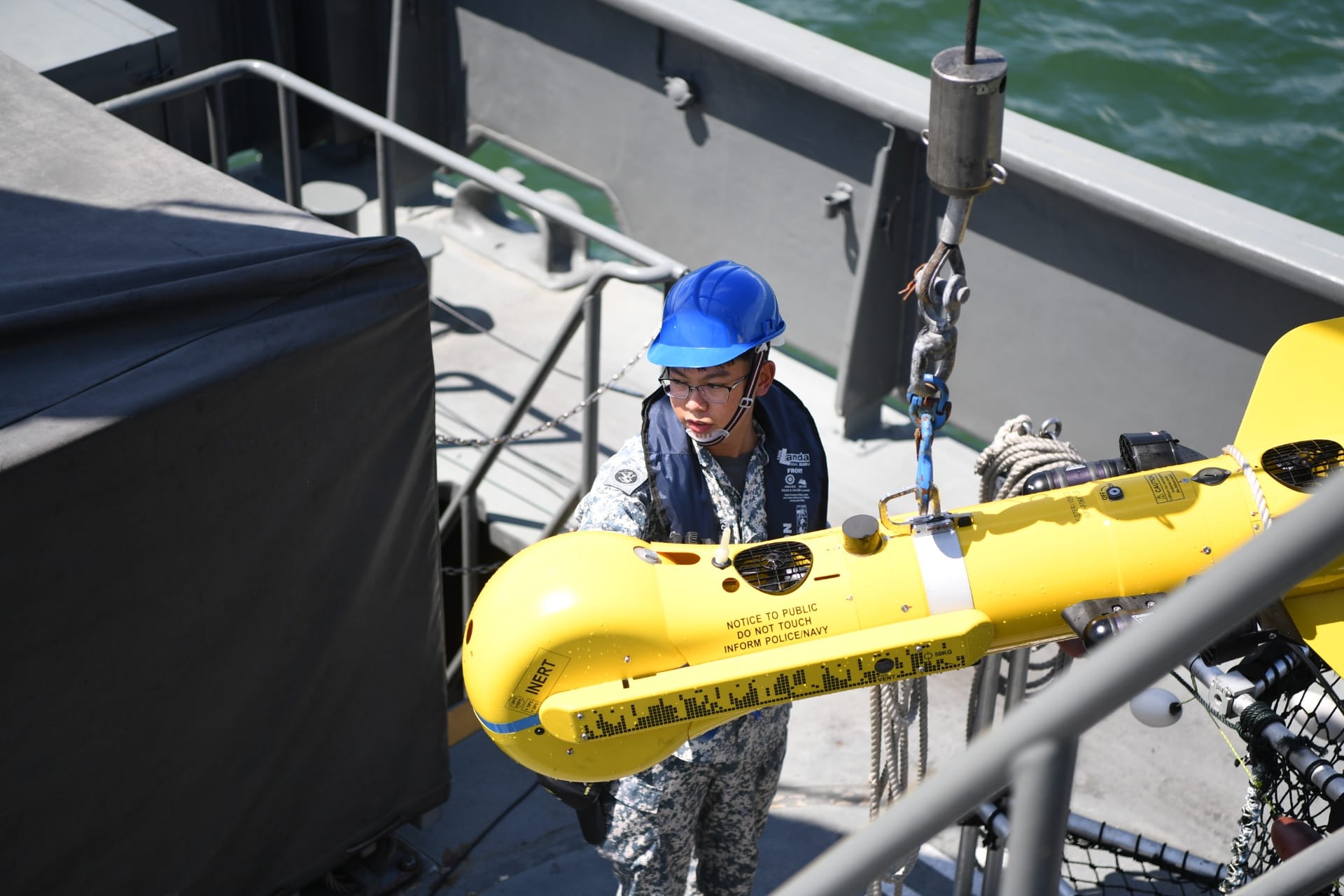 2SG Goh Song Heng, Underwater Systems Operator, recovering the K-STER expendable mine disposable system.