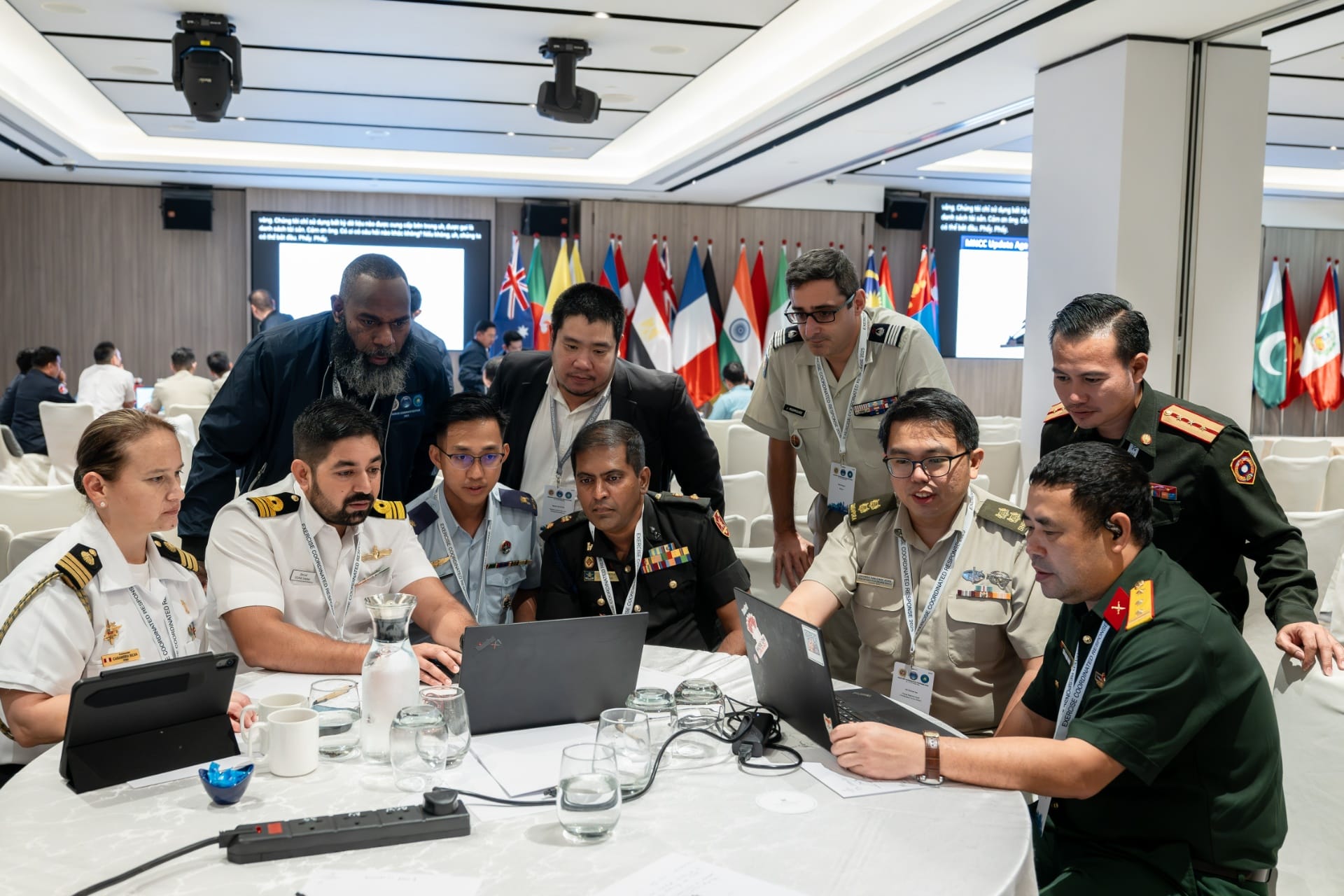 Military participants familiarising themselves with Changi RHCC’s OPERA Computer Information System (CIS) planning tool